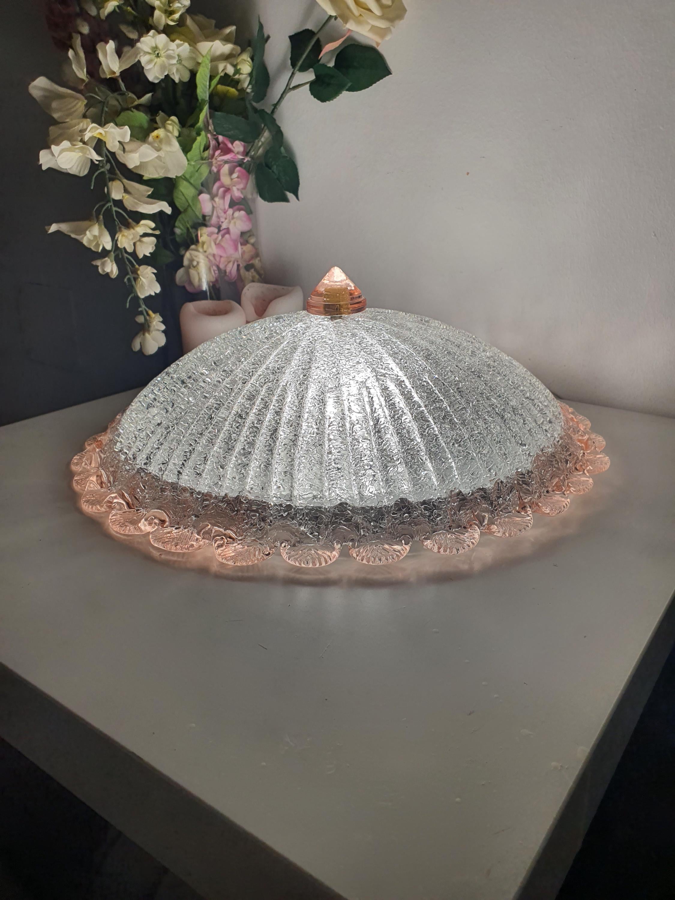 Vintage Murano floral flush mount with cone centre in bedroom, soft frosted glow, pink rim, feminine Venetian lighting