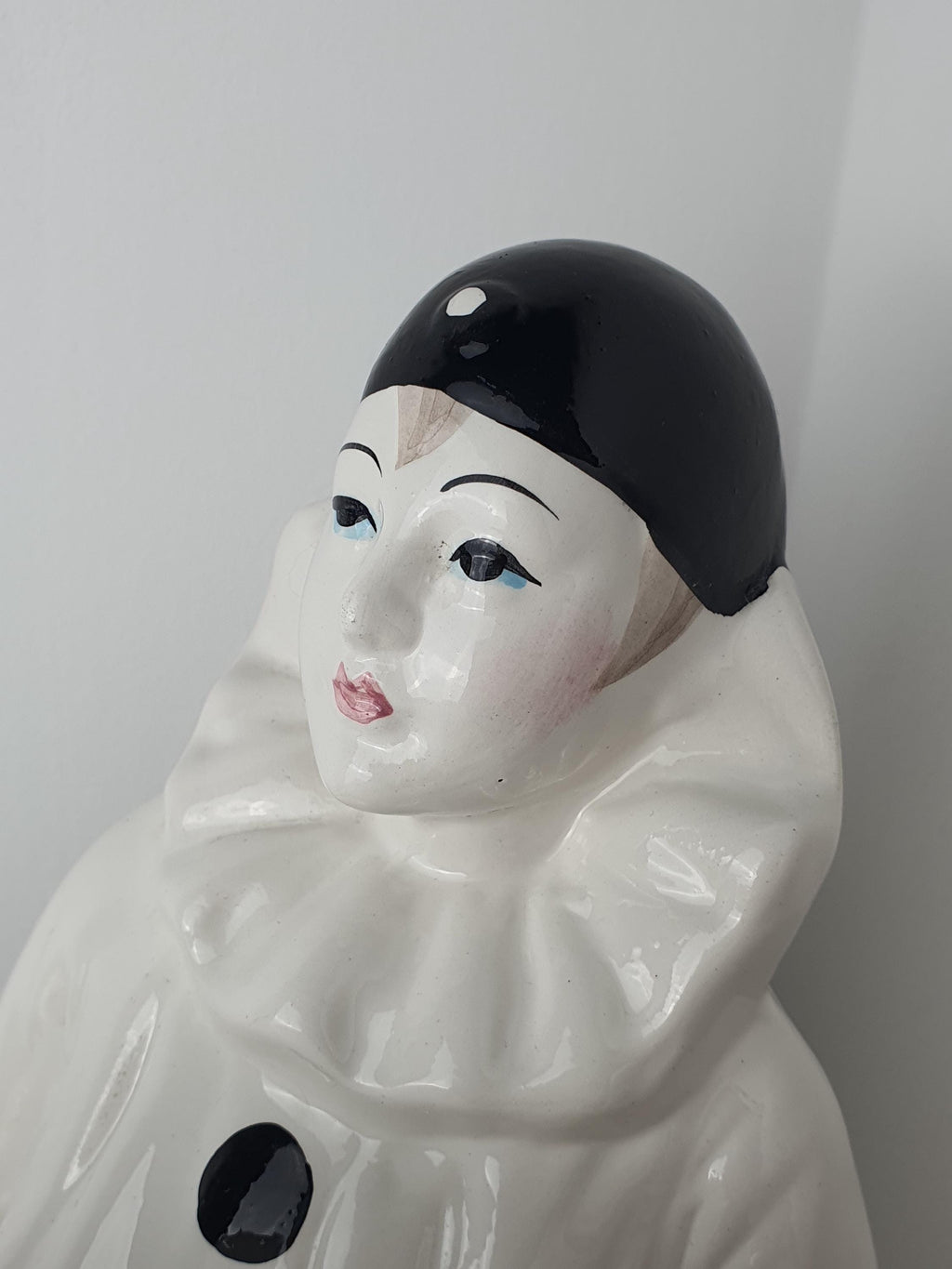 Ceramic detail and white globe contrast on vintage Italian Pierrot sad clown table lamp, commedia dell'arte, 1960s–1980s Italy