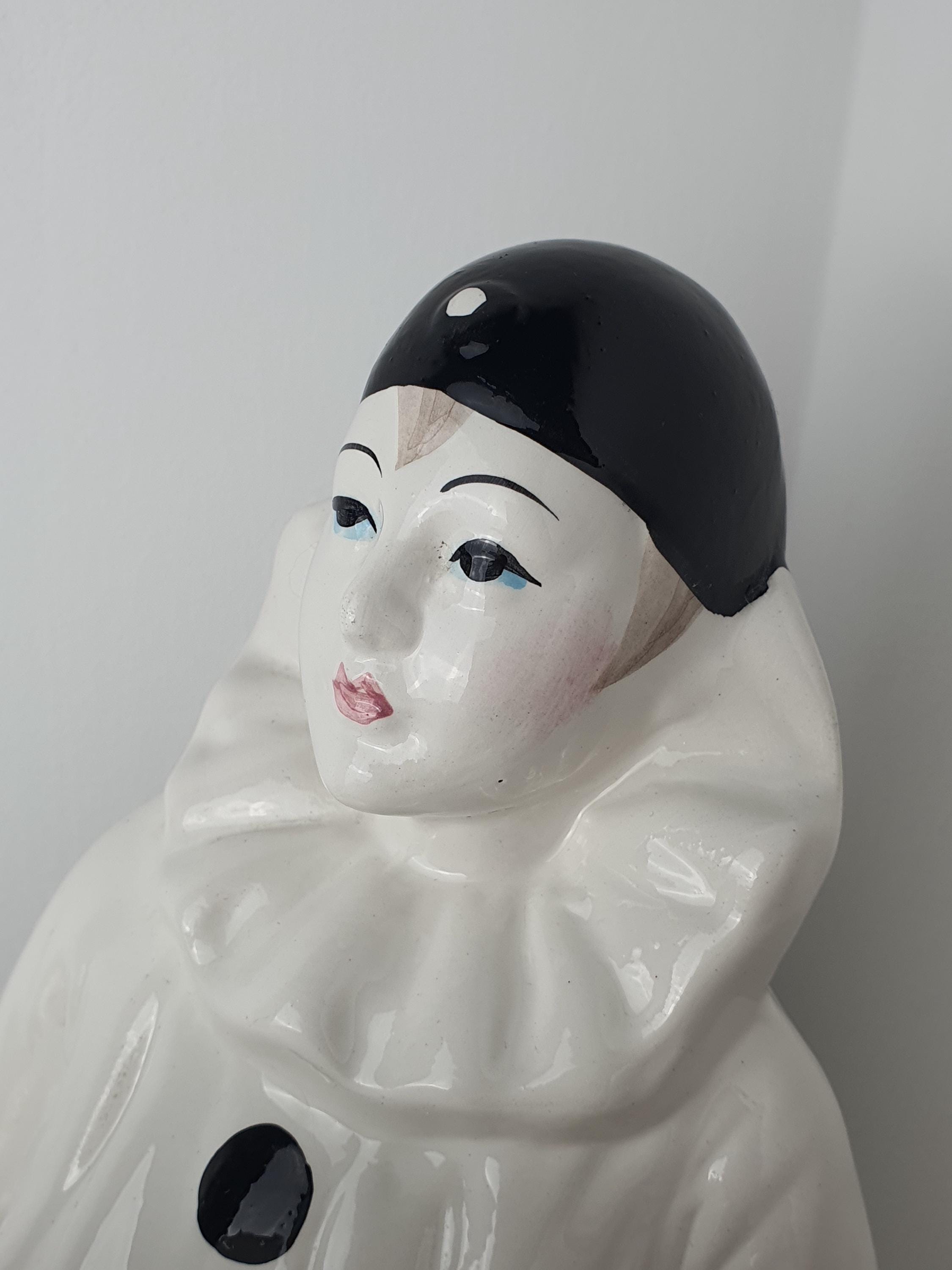 Ceramic detail and white globe contrast on vintage Italian Pierrot sad clown table lamp, commedia dell'arte, 1960s–1980s Italy