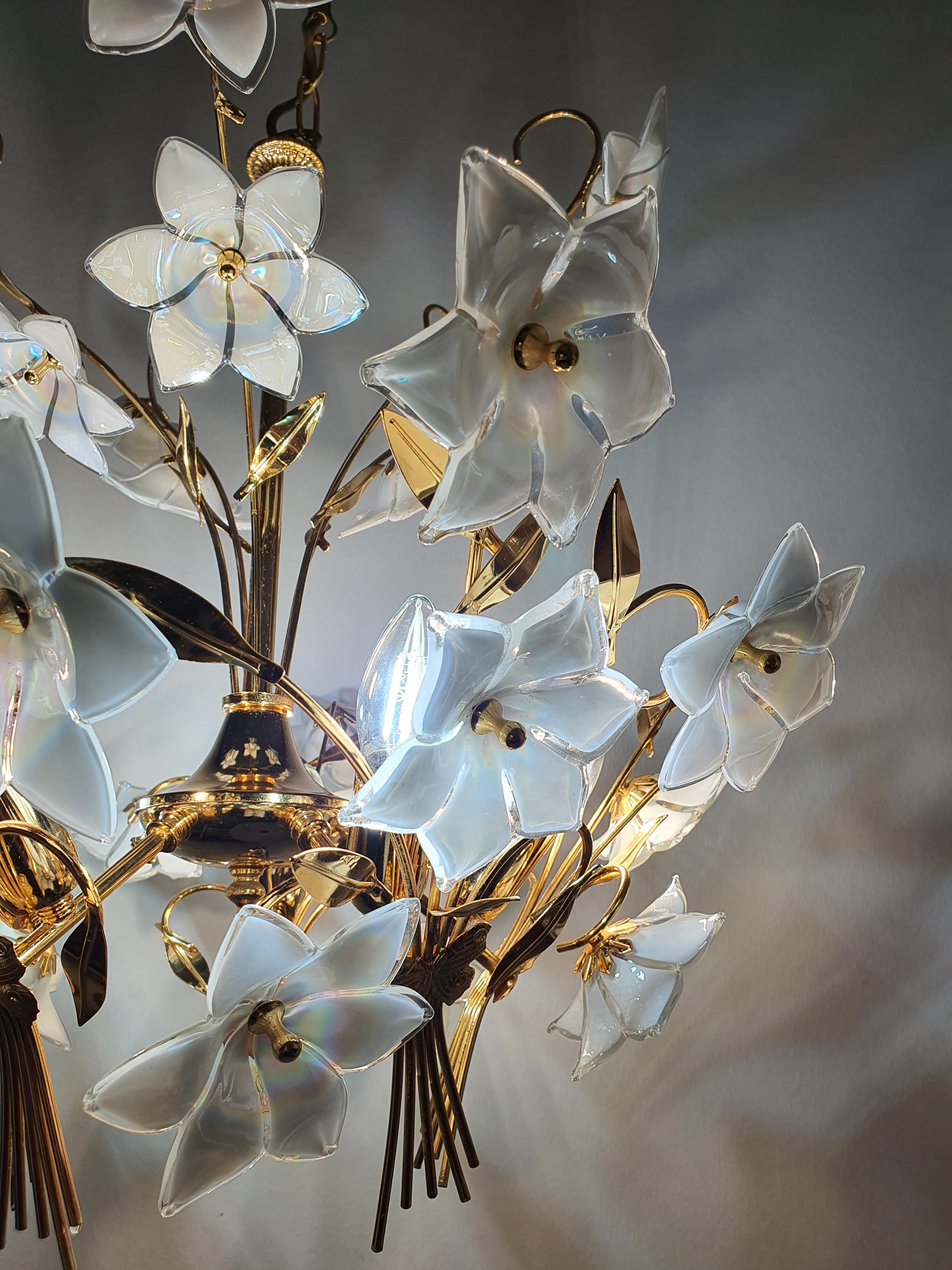 Vintage Murano floral bouquet chandelier installed above dining table, Hollywood Regency romantic interior