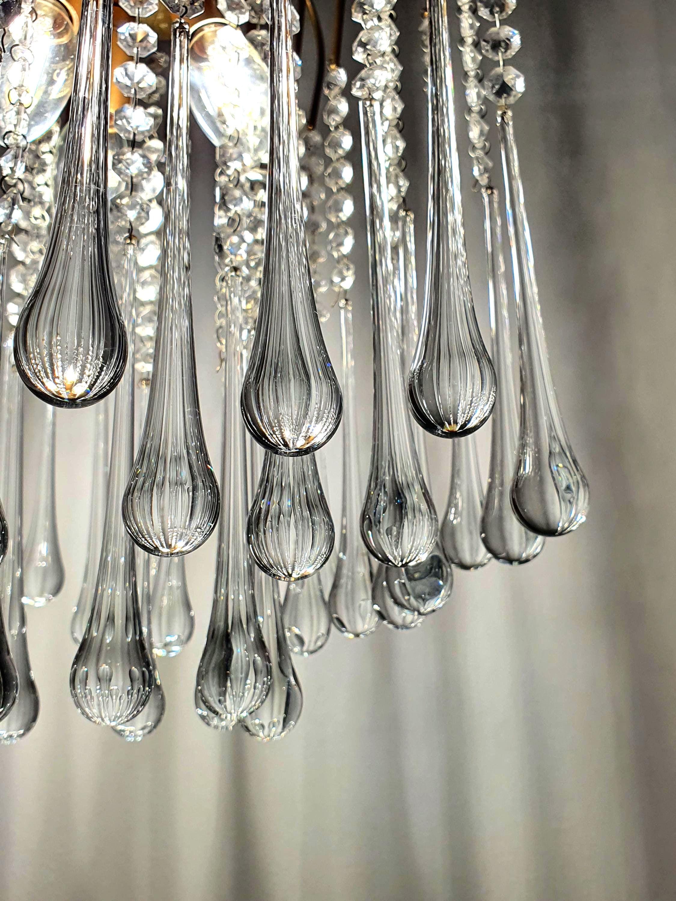 Vintage Murano glass chandelier — clear cascade teardrops and gold frame, front view