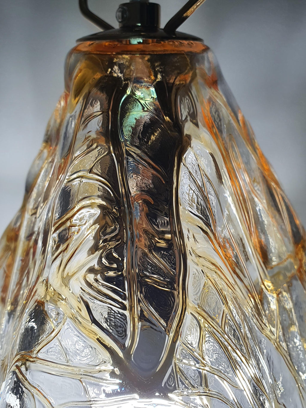 Sculptural clear and amber Murano glass shade on a La Murrina pendant light
