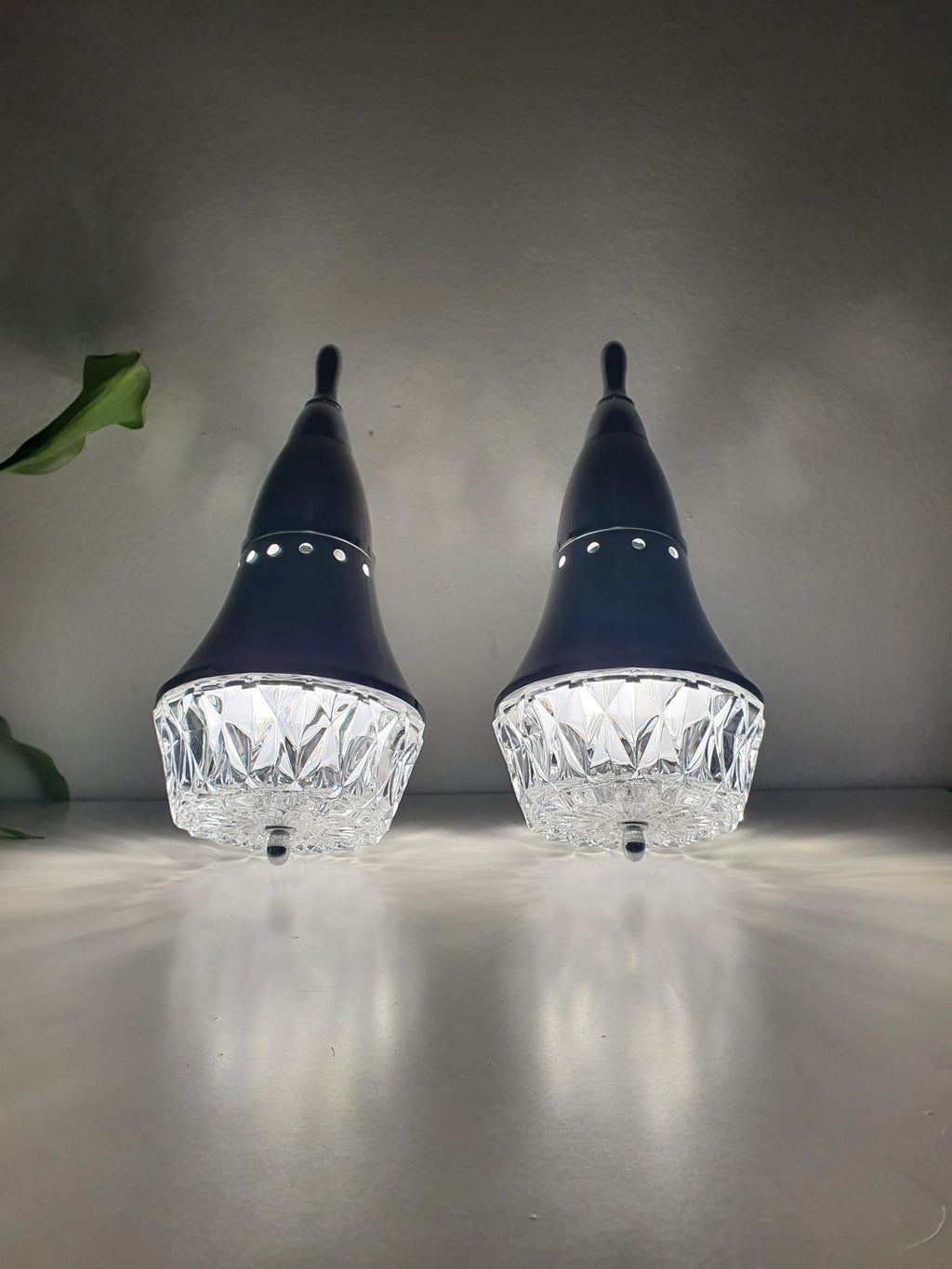 Set of 2 Space Age sconces — both fixtures shown together, entryway setting