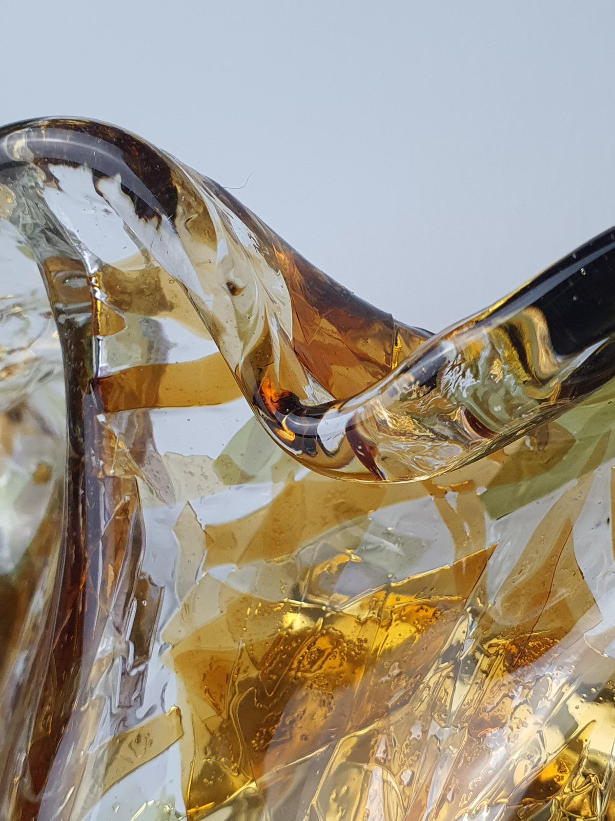Amber-orange and violet tones in a vintage La Murrina glass sconce
