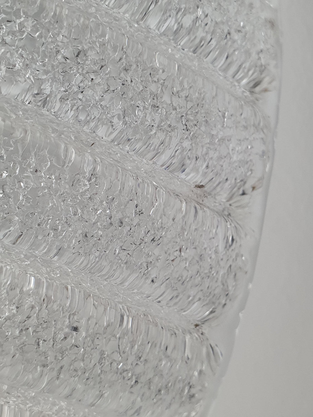 Glass-sand textured reverse finish detail on vintage Venetian shell flush mount, diffused light effect