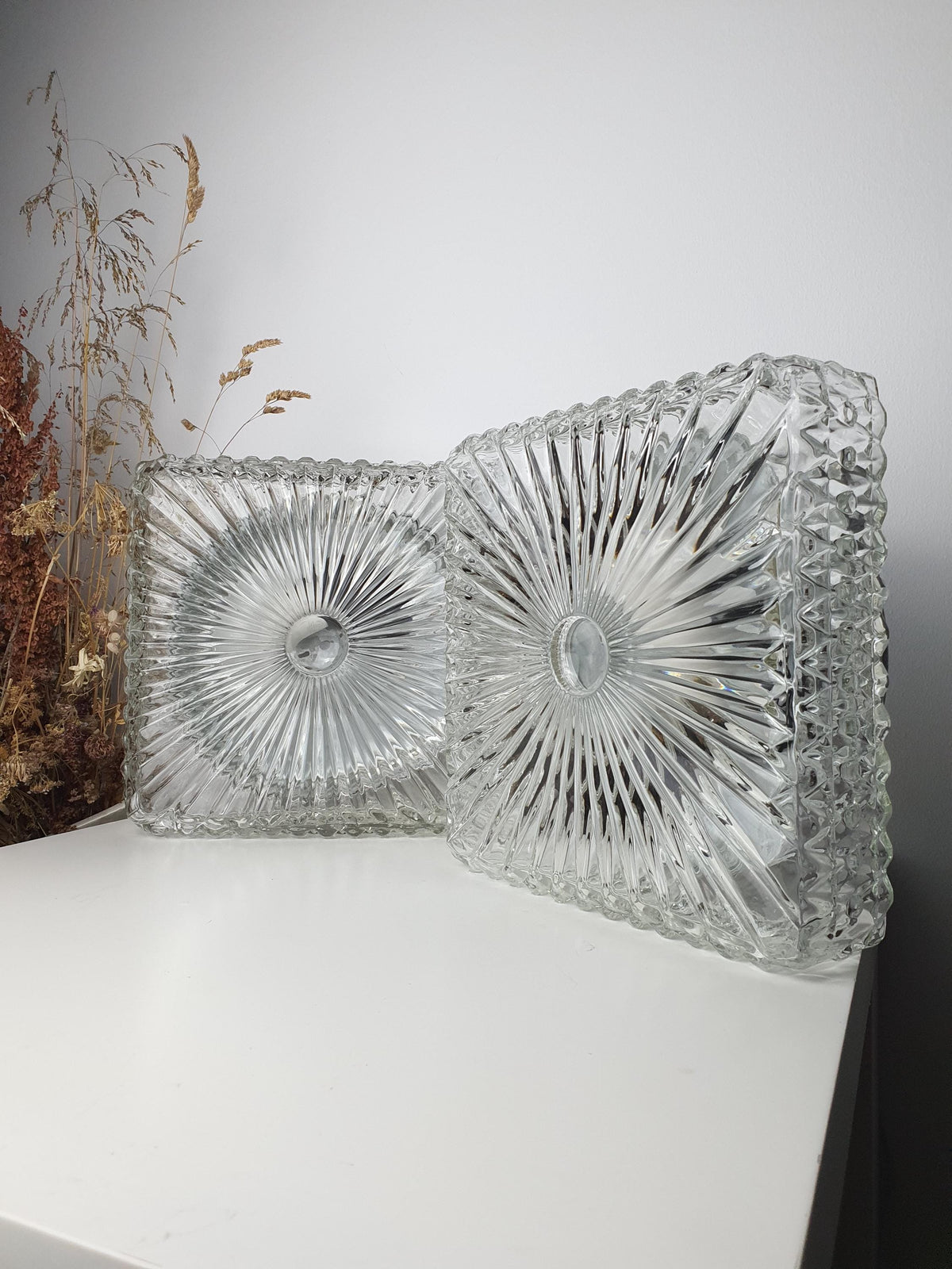 1970s Italian glass wall sconces with silver-tone metal bases
