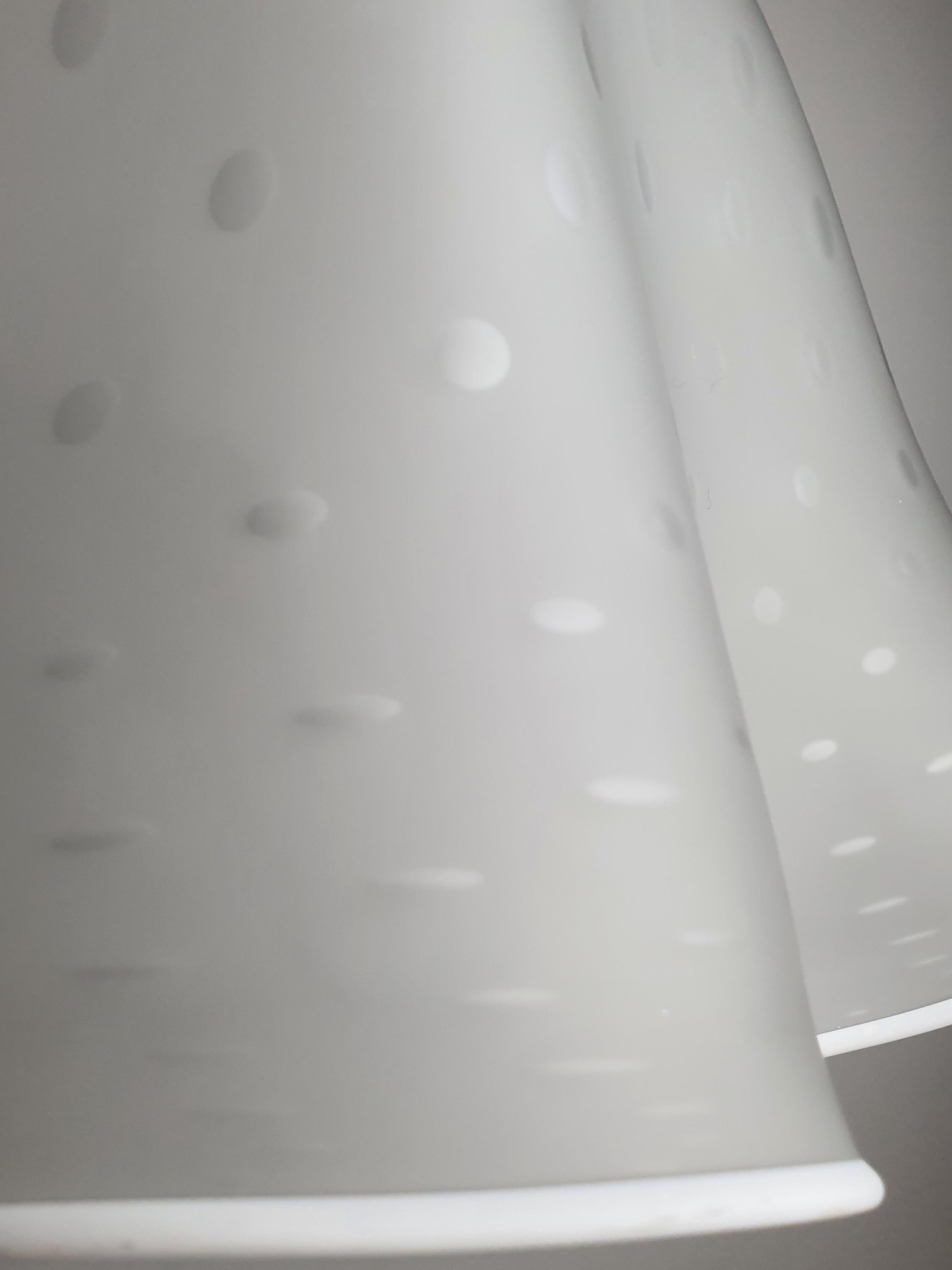 Close-up of trapped pulegoso bubbles in satin white vintage Murano glass Fazzoletto pendant shade