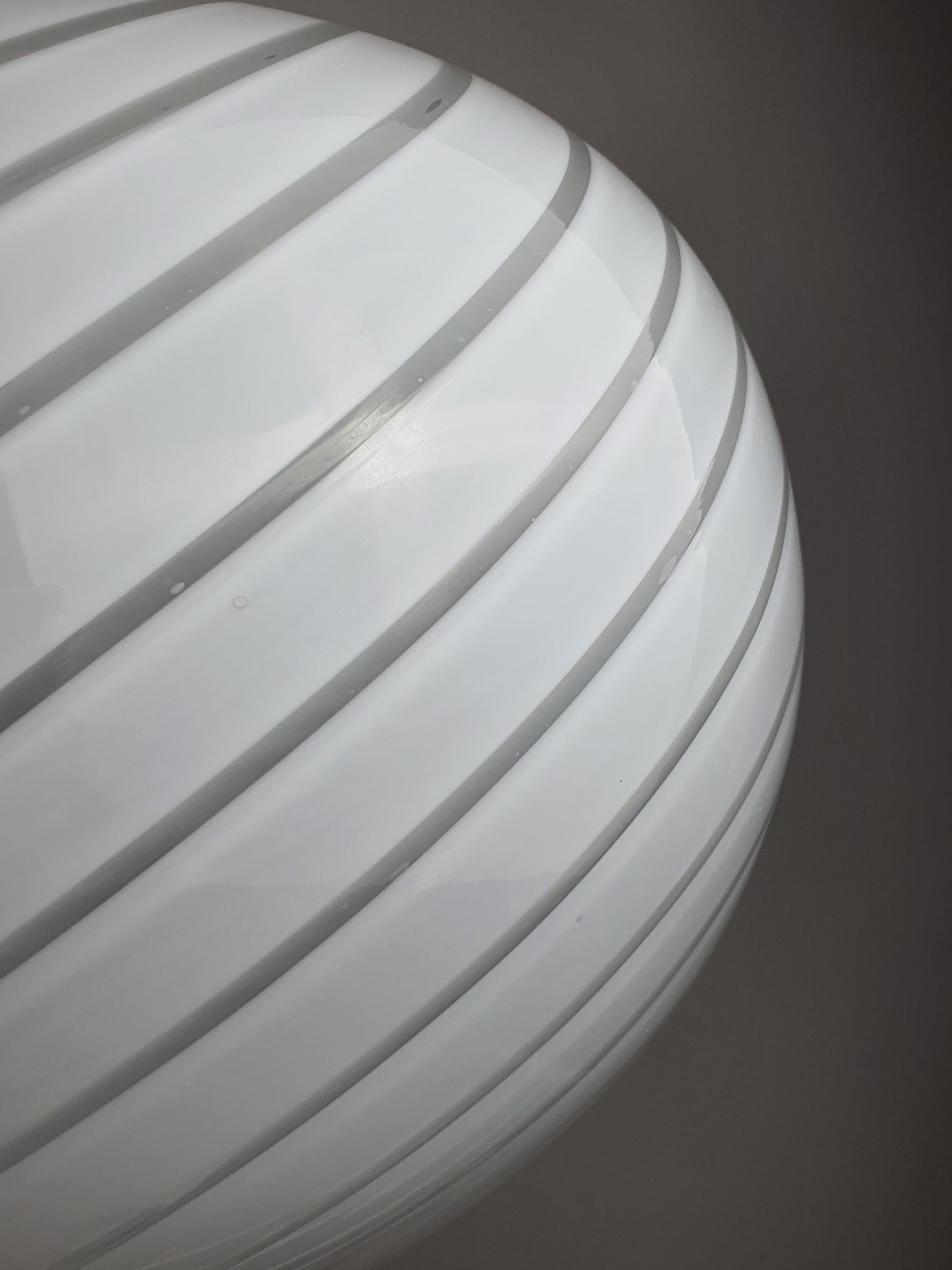 Vintage Murano white swirl globe pendant unlit, showing large globe silhouette and delicate white swirl pattern