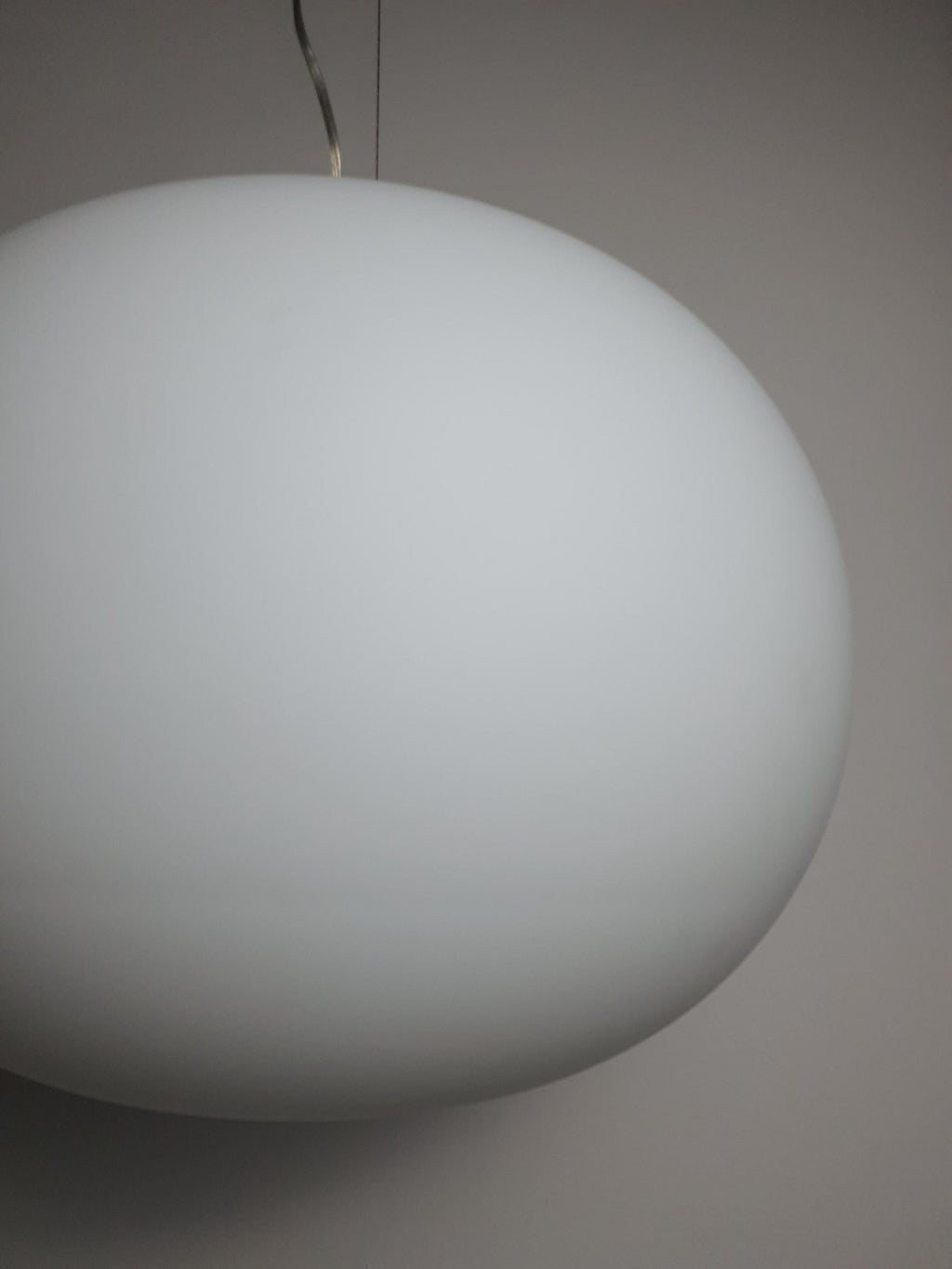 Italian minimalist globe pendant light — glare-free satin opaline glass, side profile