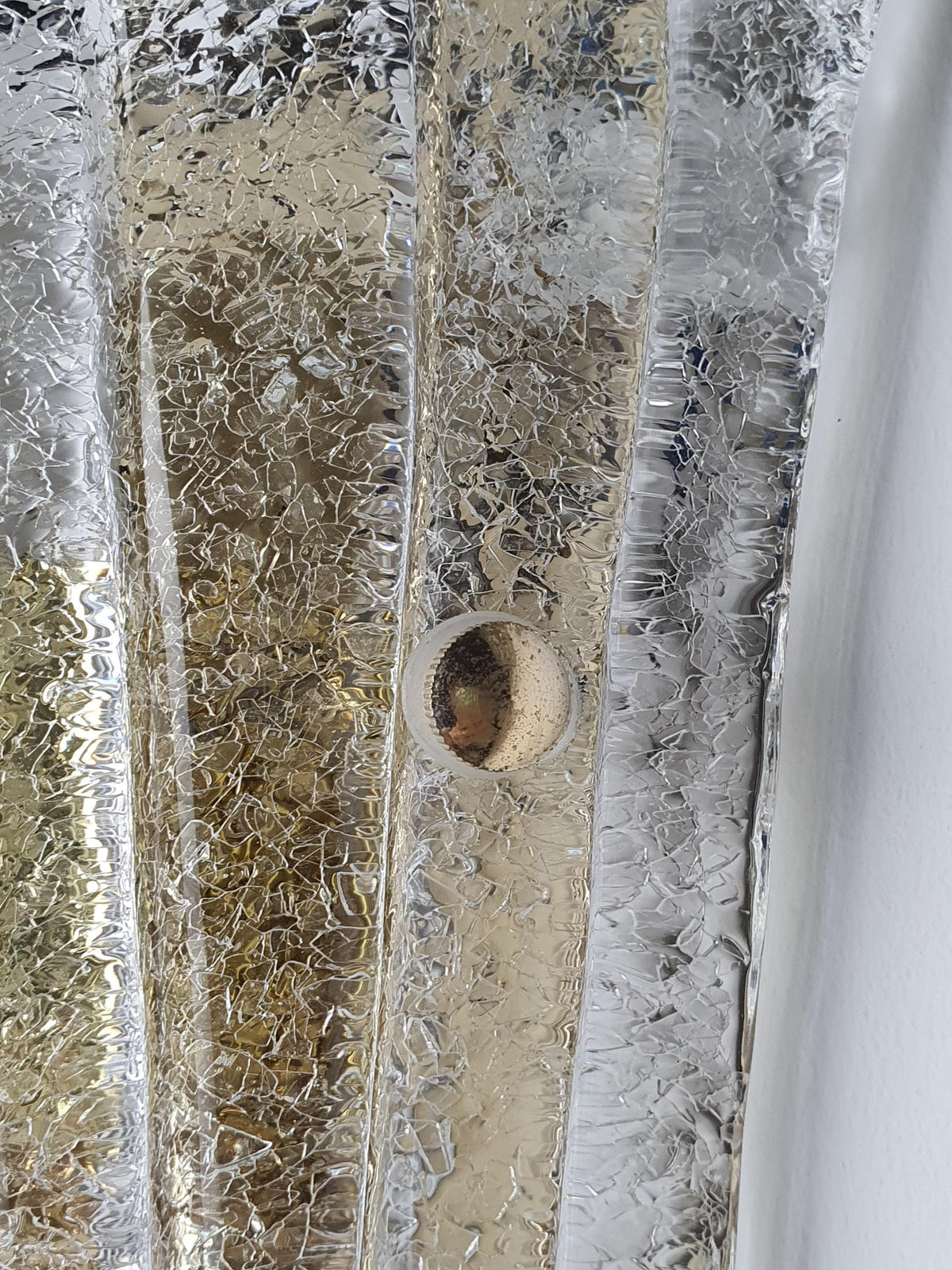 Graniglia ice-glass texture on a vintage Murano shell wall sconce
