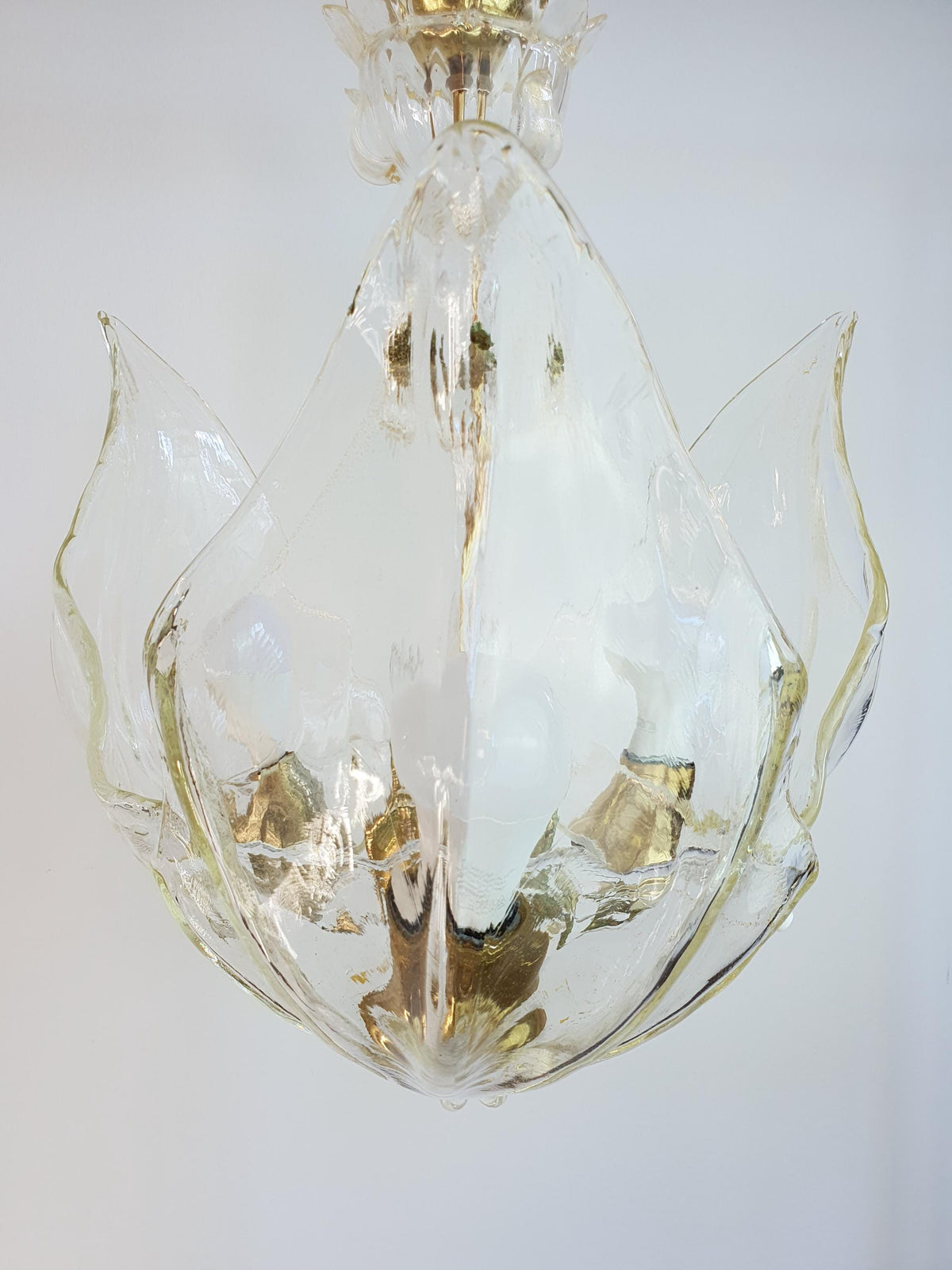 Three-arm La Murrina chandelier with clear floral glass and a gold-toned frame
