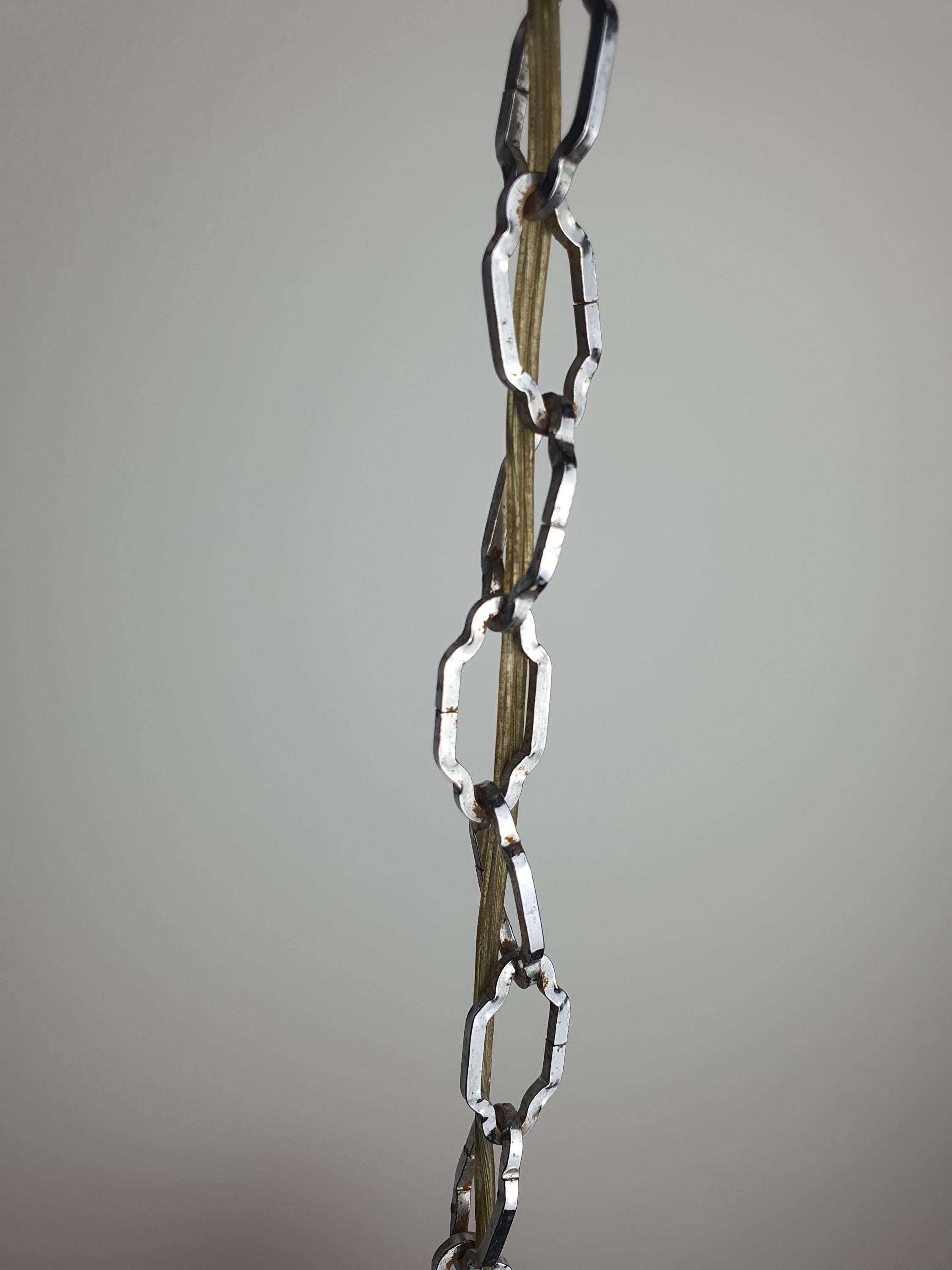 Veca chandelier — thick pink glass elements and chrome arm detail