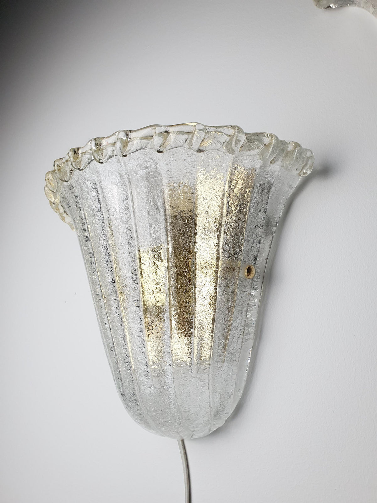 Sculptural shell silhouette of a large vintage Murano glass wall light
