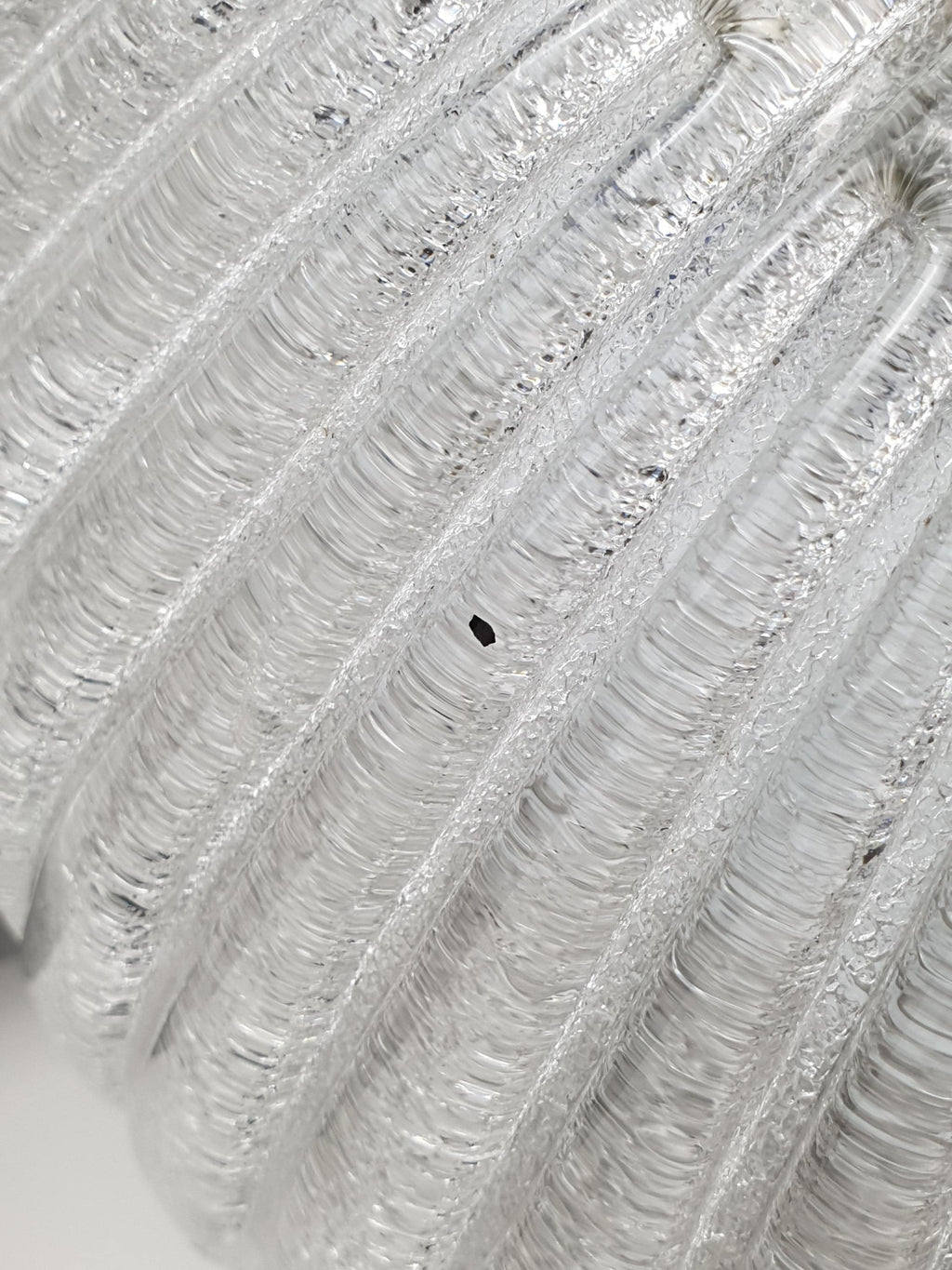 Smooth transparent exterior detail of vintage Venetian glass shell flush mount, ribbed relief, Art Deco style