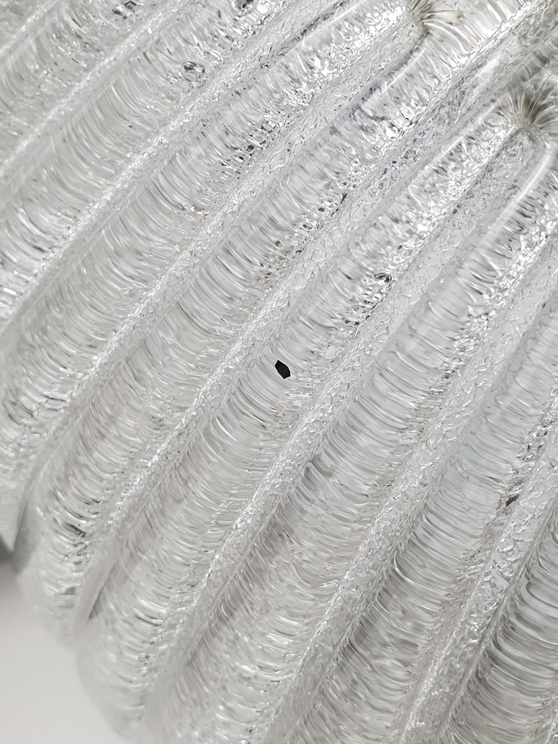 Smooth transparent exterior detail of vintage Venetian glass shell flush mount, ribbed relief, Art Deco style