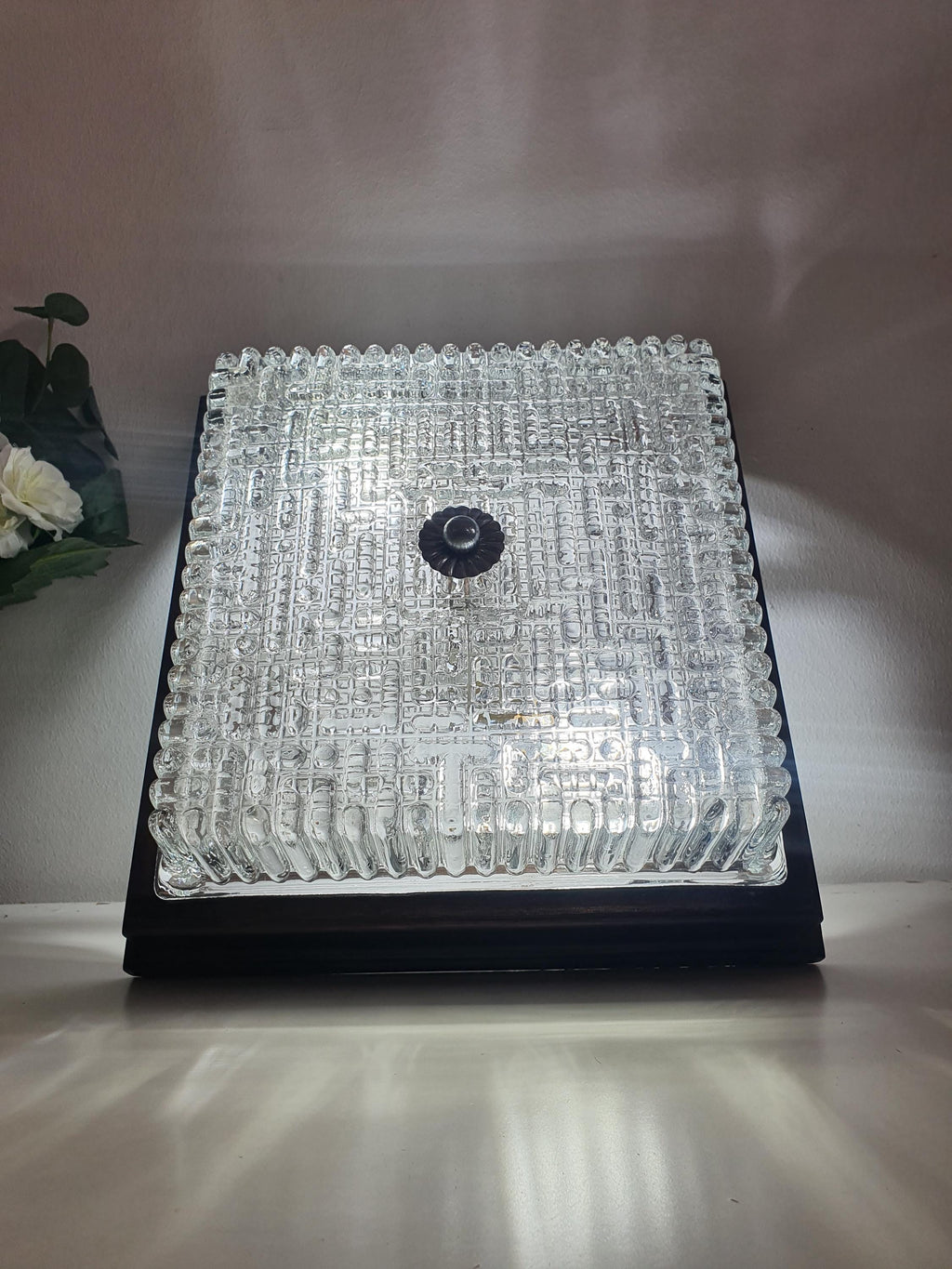 Vintage Italian square Brutalist light lit, dynamic ribbed glass reflections and shadows, wood frame, MCM interior