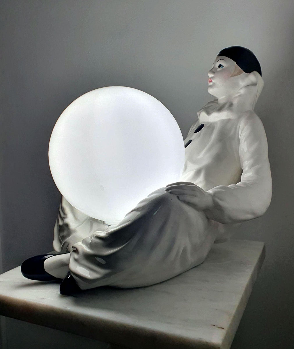 Vintage Italian ceramic Pierrot sad clown table lamp, white globe diffuser, commedia dell'arte figurine base, Italy 1960s–1980s