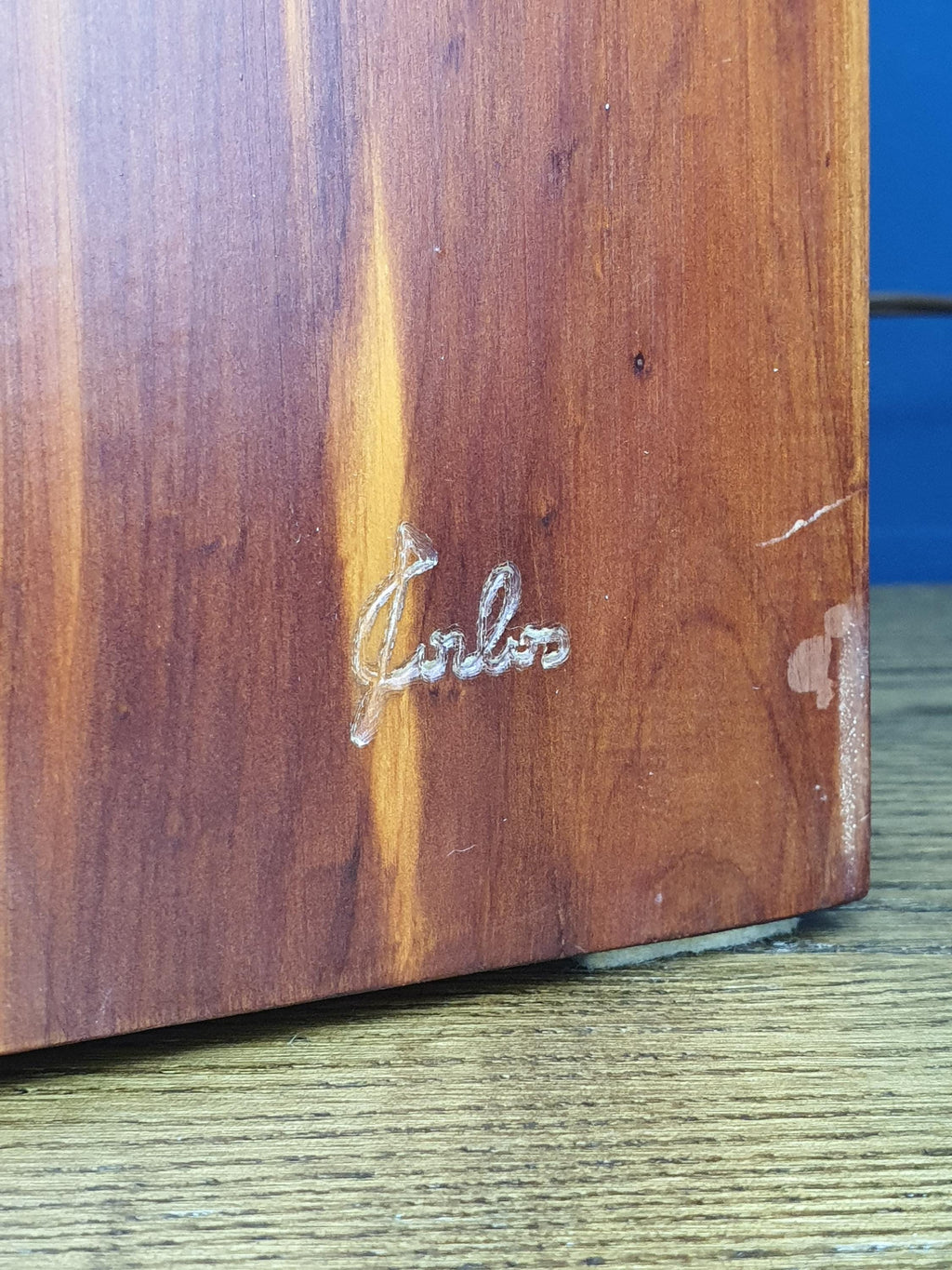 Close-up of Carlo signature on vintage Italian Brutalist table lamp, 1970s Studio Craft provenance detail