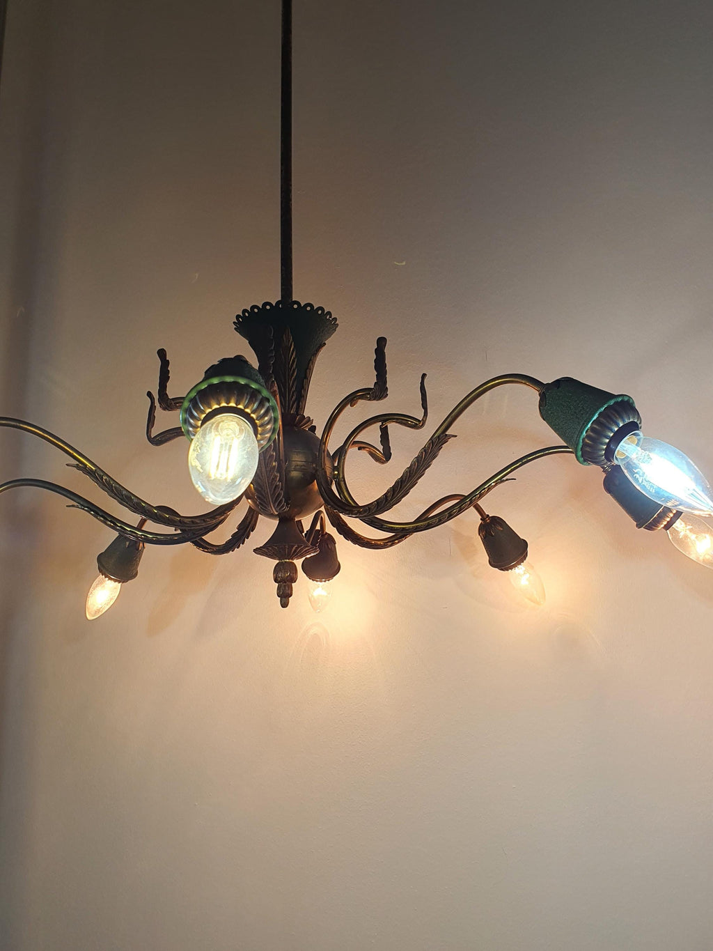 Vintage 1950s Italian 8-arm Sputnik chandelier in dining room, dramatic starburst, brass bronze green leaf, high ceiling