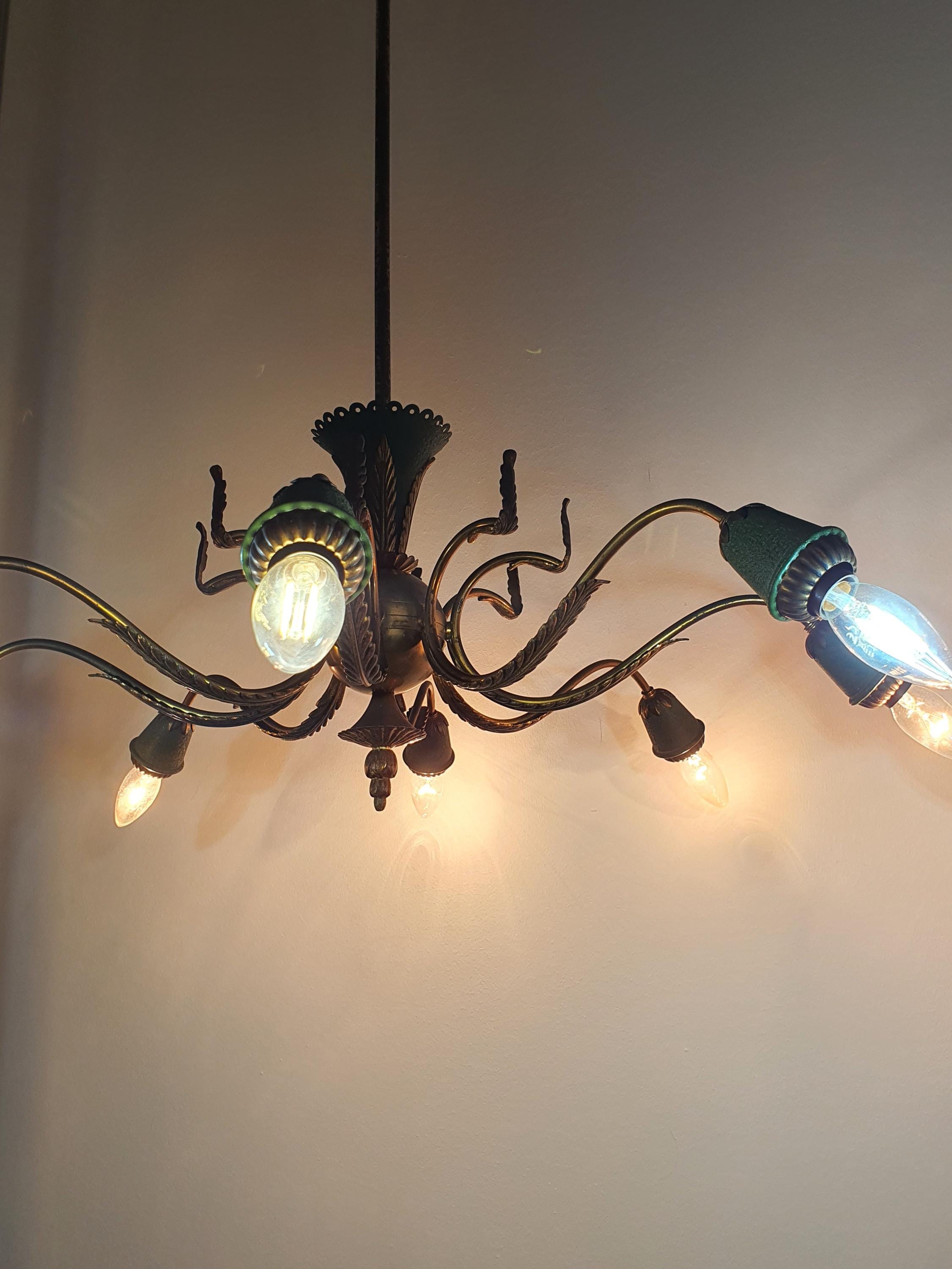 Vintage 1950s Italian 8-arm Sputnik chandelier in dining room, dramatic starburst, brass bronze green leaf, high ceiling