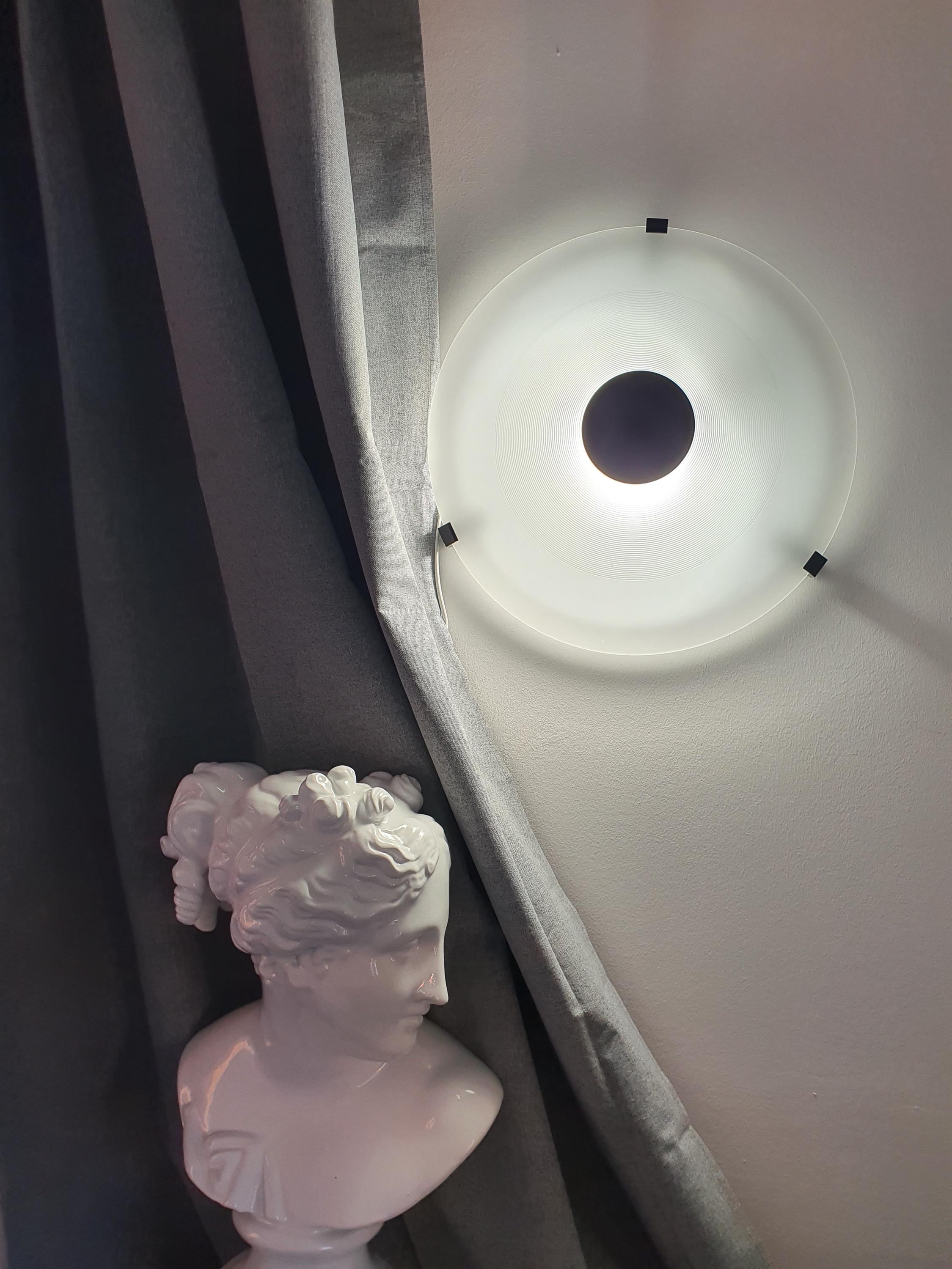 F. Fabbian vintage Italian Memphis pyramid light medium — frosted glass and black metal, front view