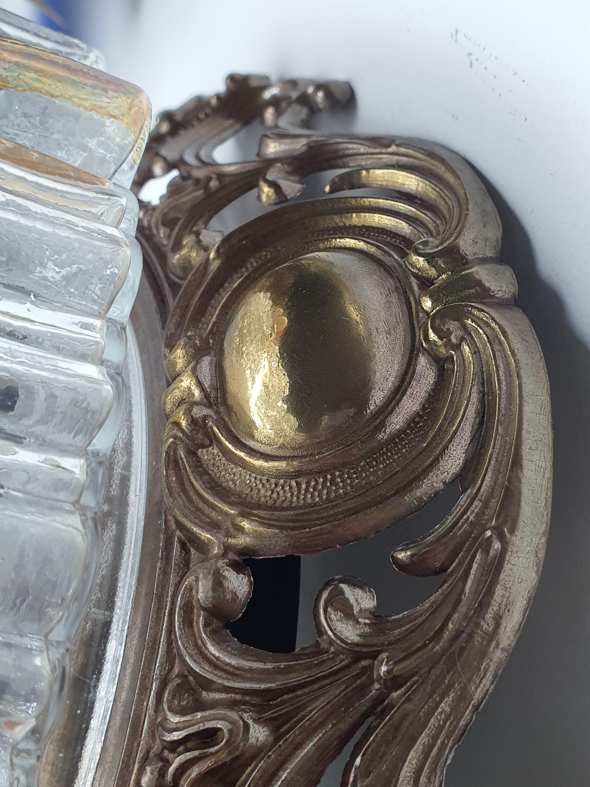 Art Deco ceiling light in stamped clear and iridescent glass on brass base
