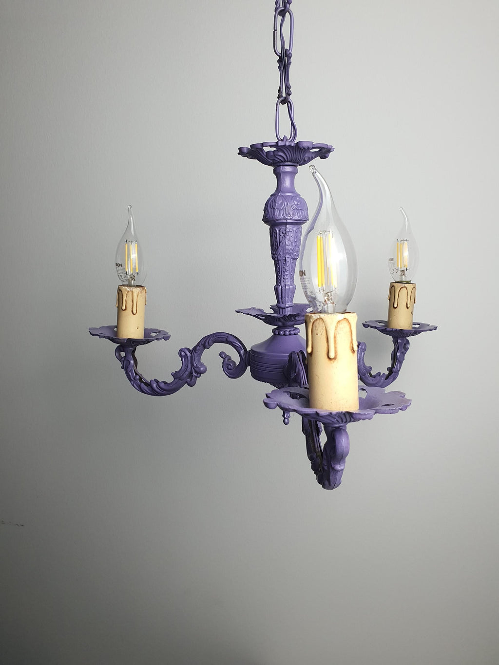 Later purple paintwork on a vintage Italian metal chandelier
