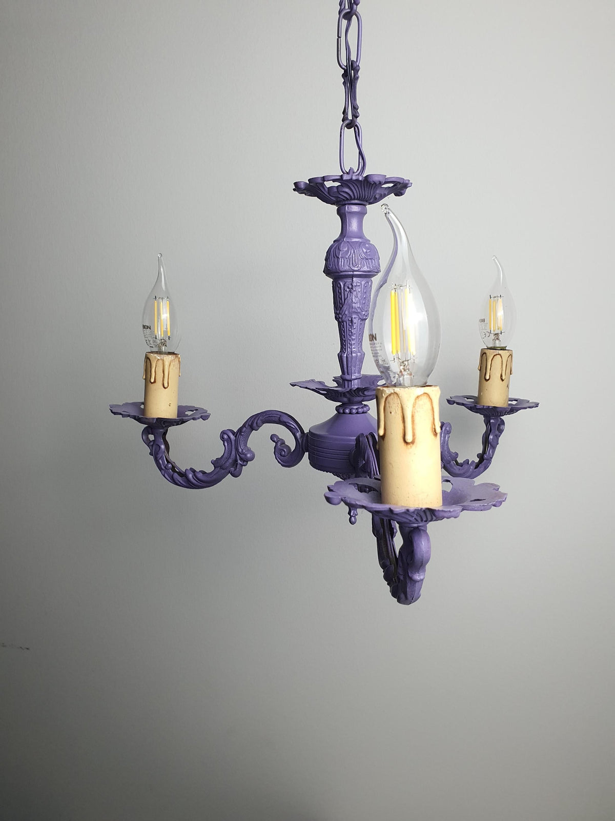Later purple paintwork on a vintage Italian metal chandelier
