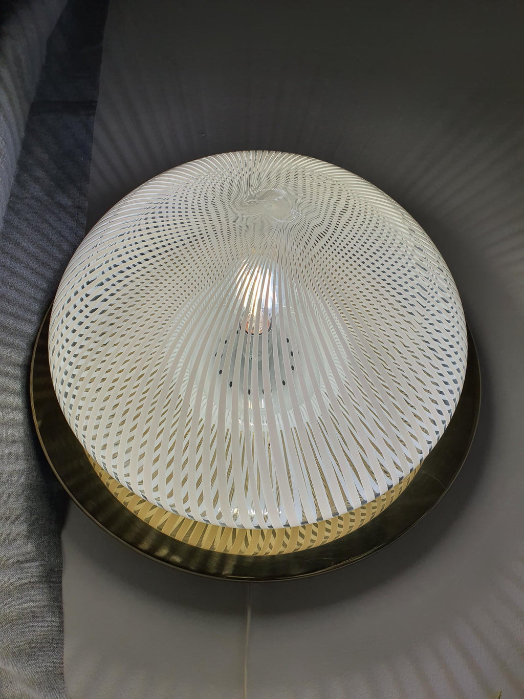 Venini Murano glass flush mount unlit, showing filigree glass texture and gold base patina
