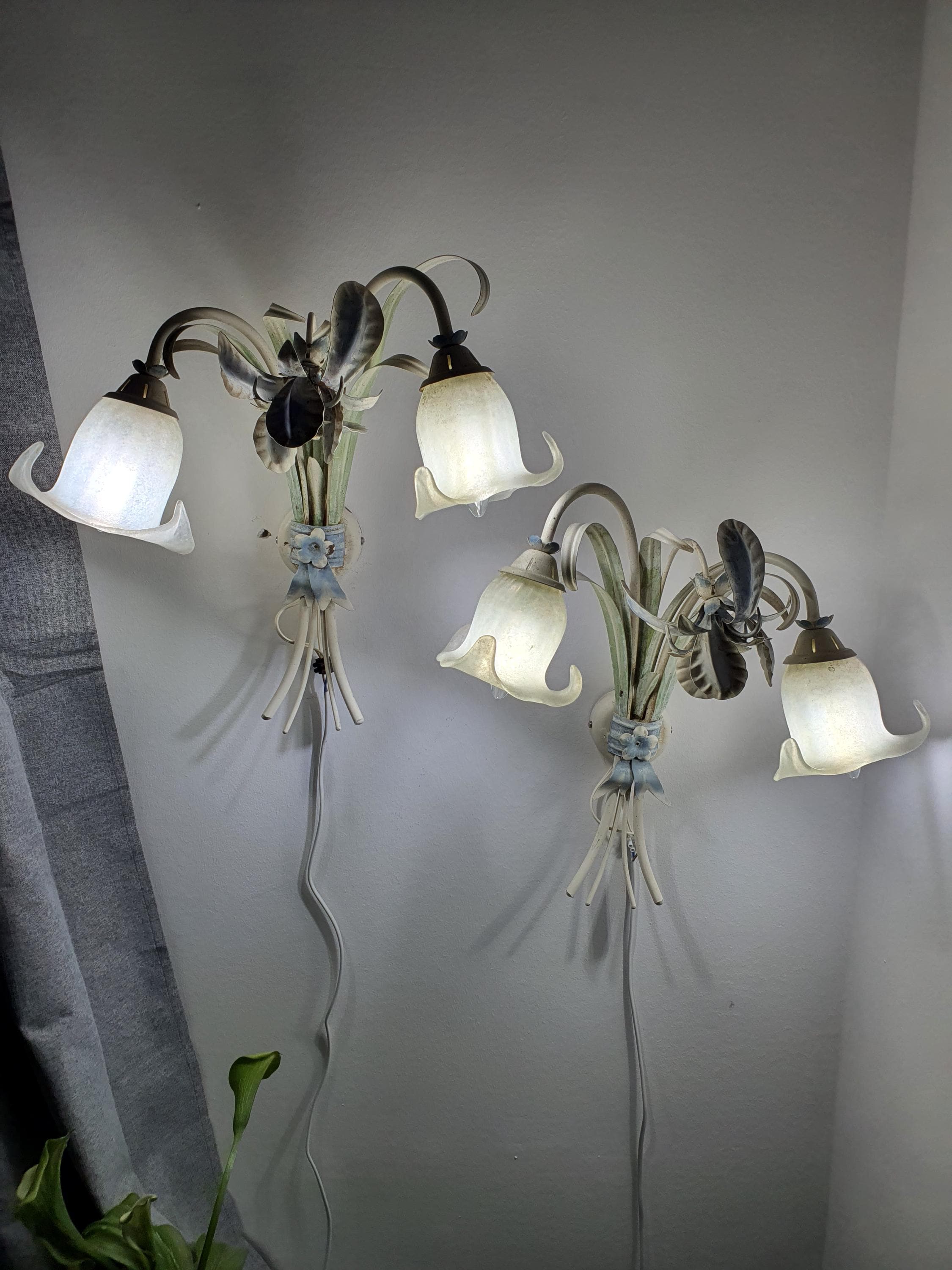 Handcrafted Italian toleware sconce — sculptural iris bouquet silhouette, side profile