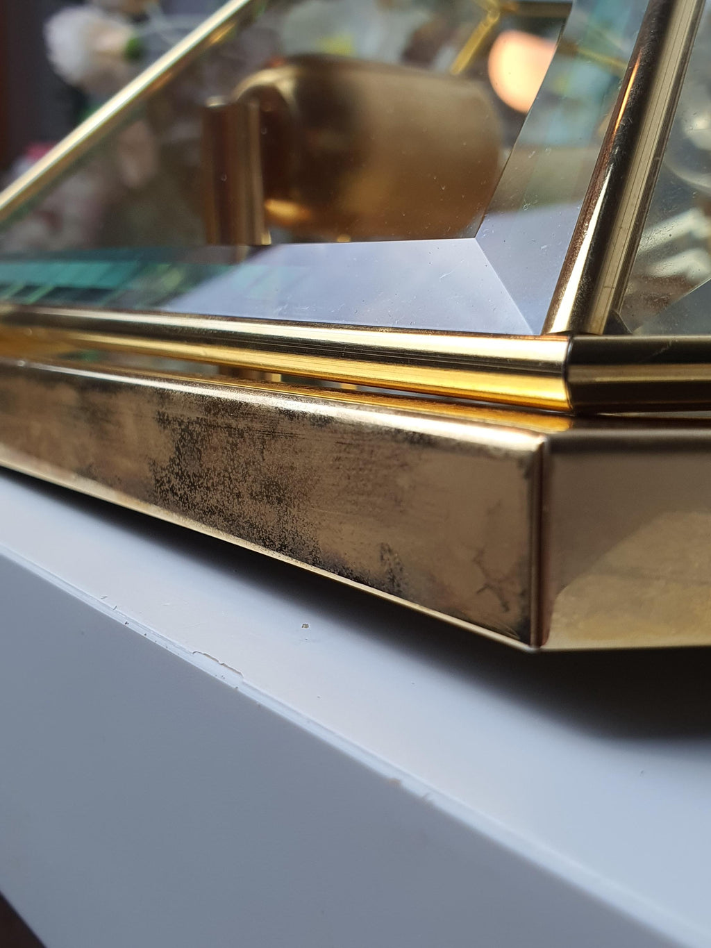 Close-up of faceted mirrored glass panels and gold-toned accents, vintage Italian hexagonal light, 1970s Hollywood Regency