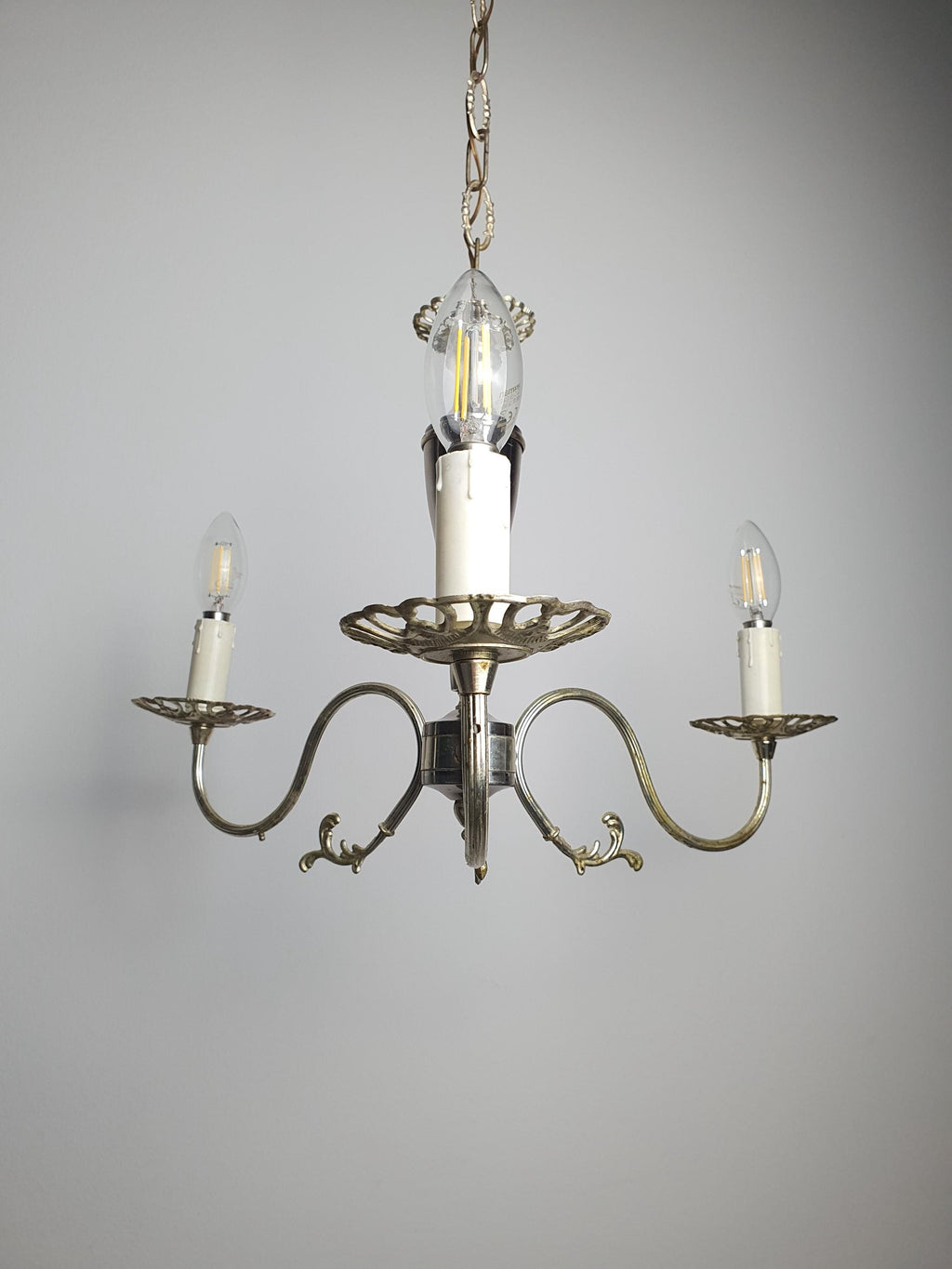 1950s Italian candle chandelier front view, three curved arms, silver-tone metal, candle-style sockets