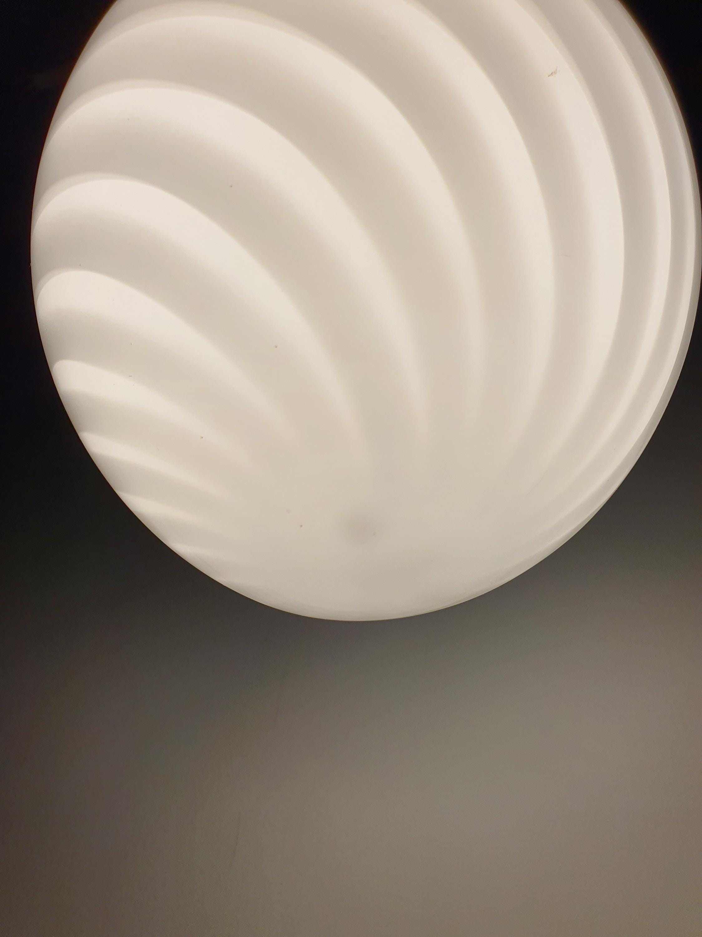 Vintage Murano white swirl egg pendant unlit, showing full 25×28cm egg silhouette, white swirl within glass, brass fittings