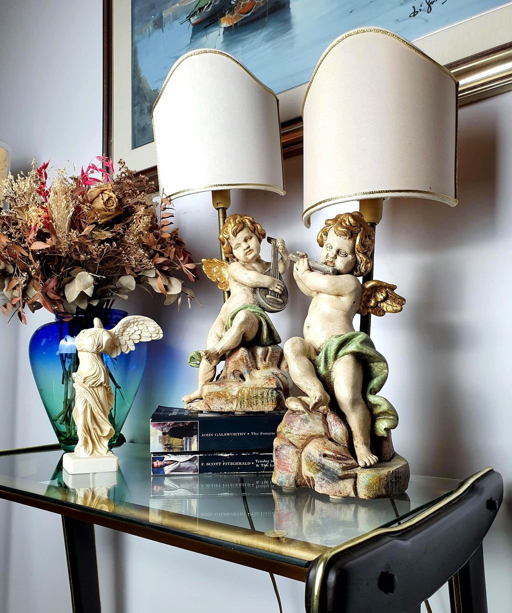 Pair of Italian Florentine cherub angel table lamps, hand-painted wood, gold accents, fabric shades, Baroque style