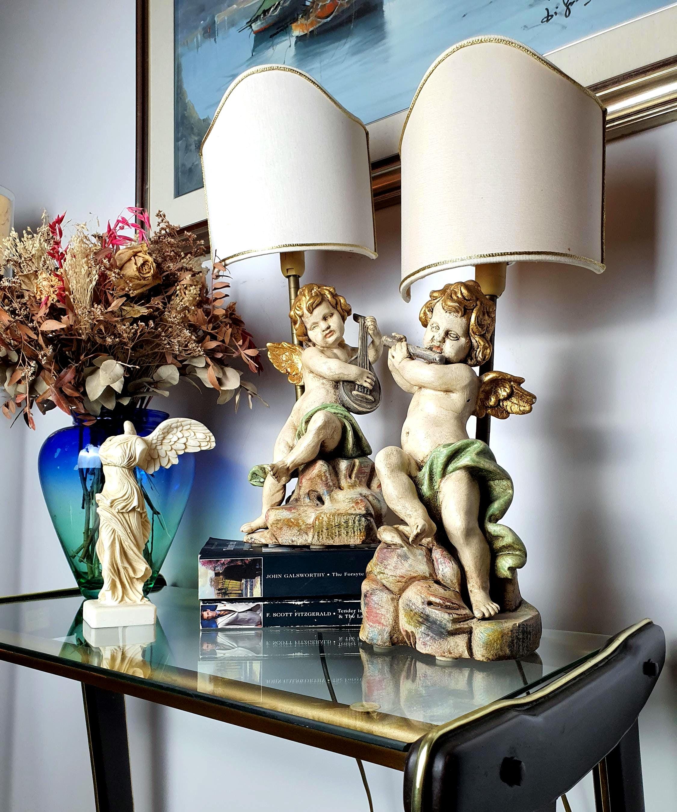 Pair of Italian Florentine cherub angel table lamps, hand-painted wood, gold accents, fabric shades, Baroque style