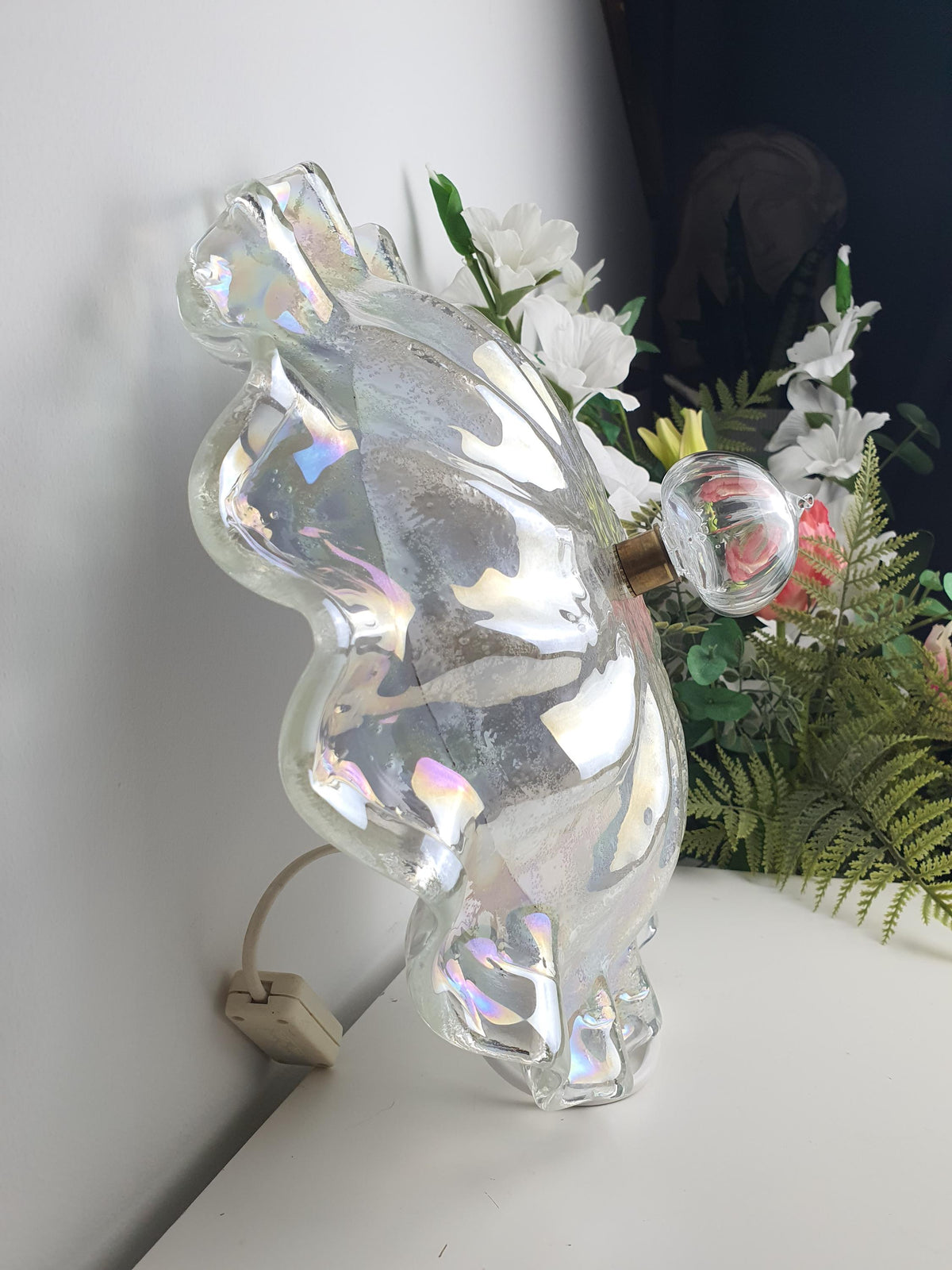 Smooth glossy side of an iridescent Murano glass shade
