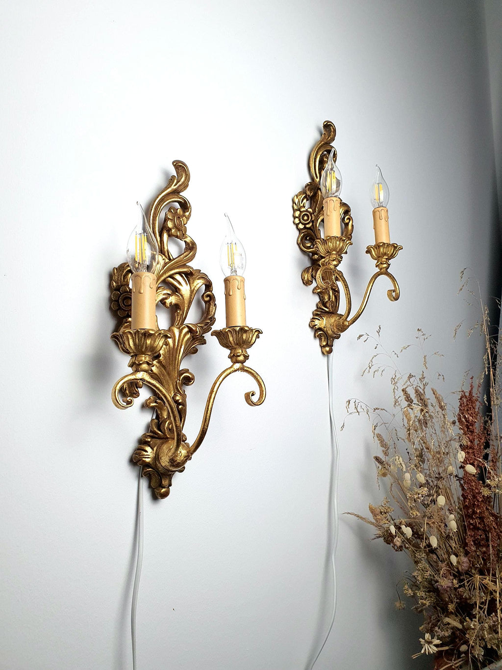 Pair of vintage Florentine carved wood wall sconces with an aged gold finish
