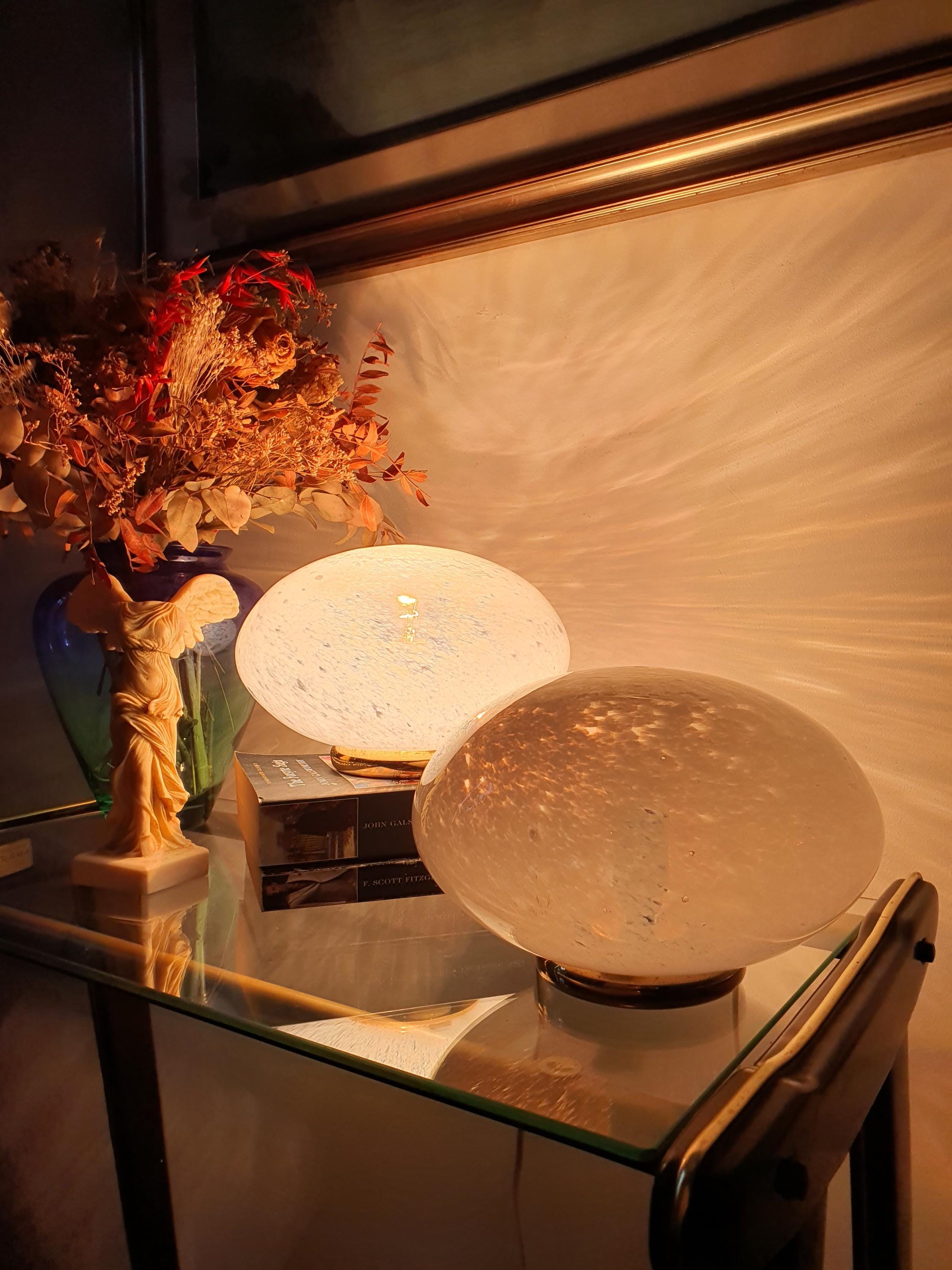 Pair of labelled Vetri di Murano globe table lamps, clear glass with white spotted moonstone effect, brass bases, 1980s