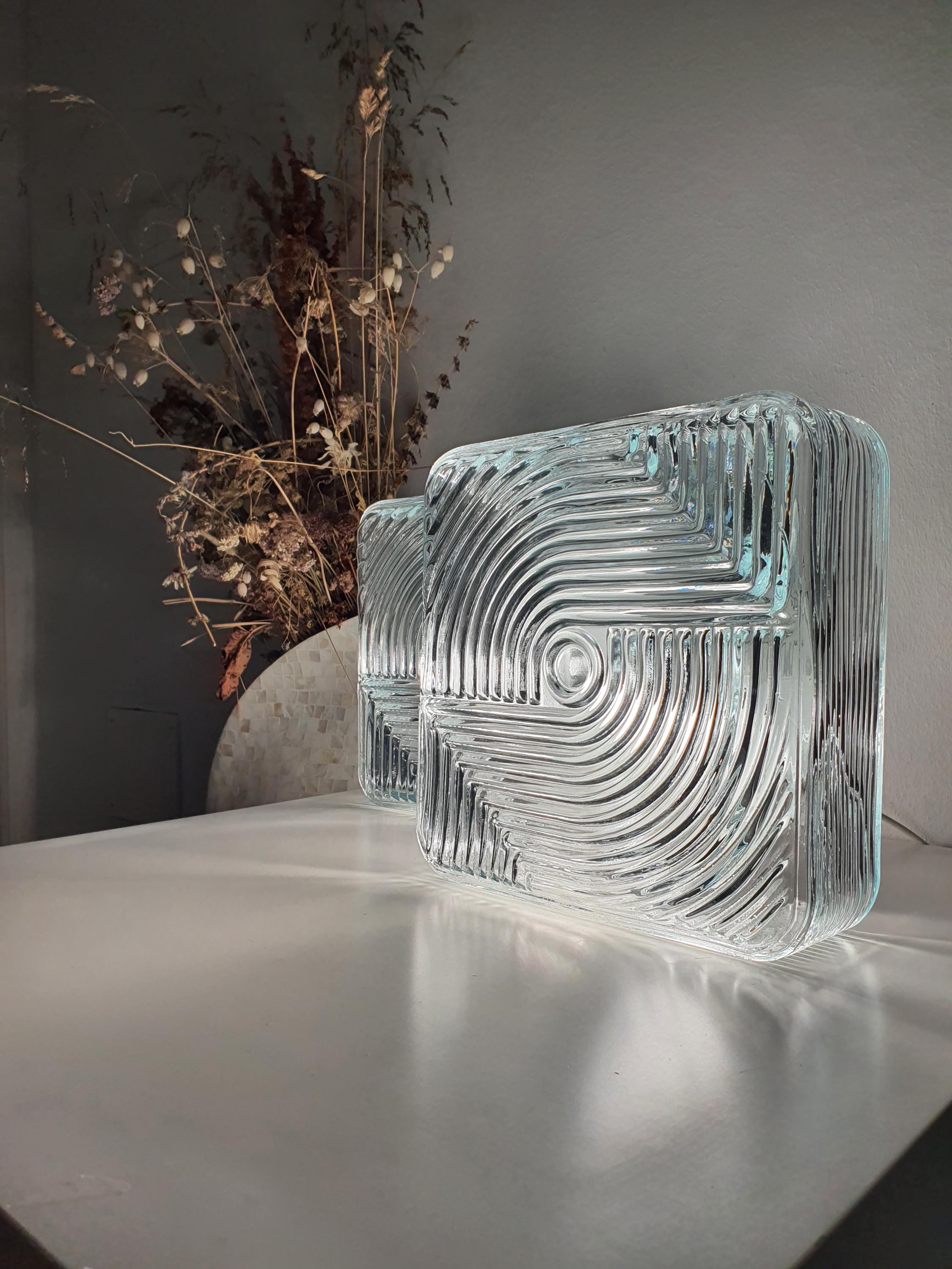 Vintage square Brutalist MCM wall sconce unlit, showing 23×23cm square stamped glass silhouette and metal base