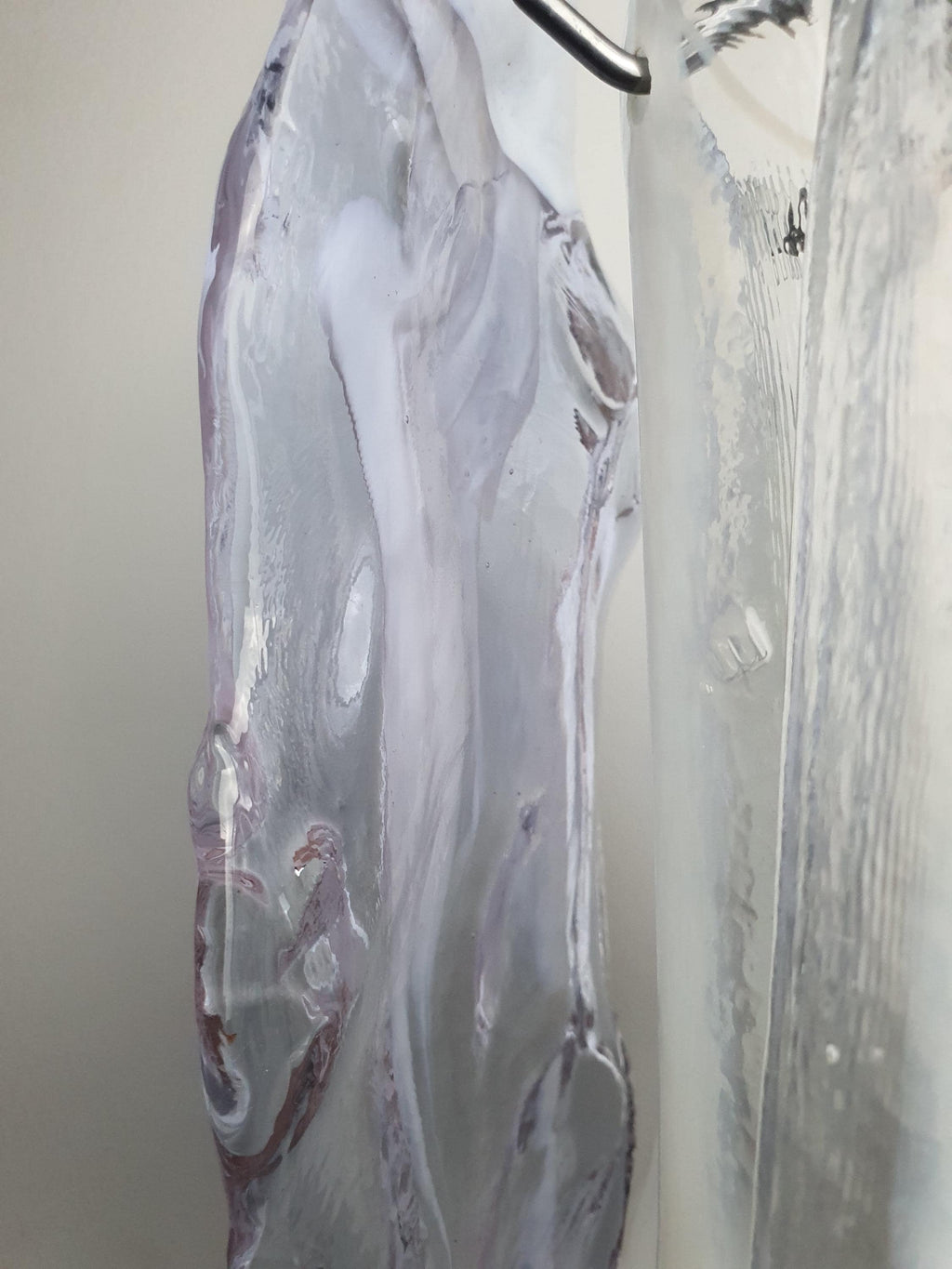 Clear and lilac glass petals with white spots on a composed Italian chandelier

