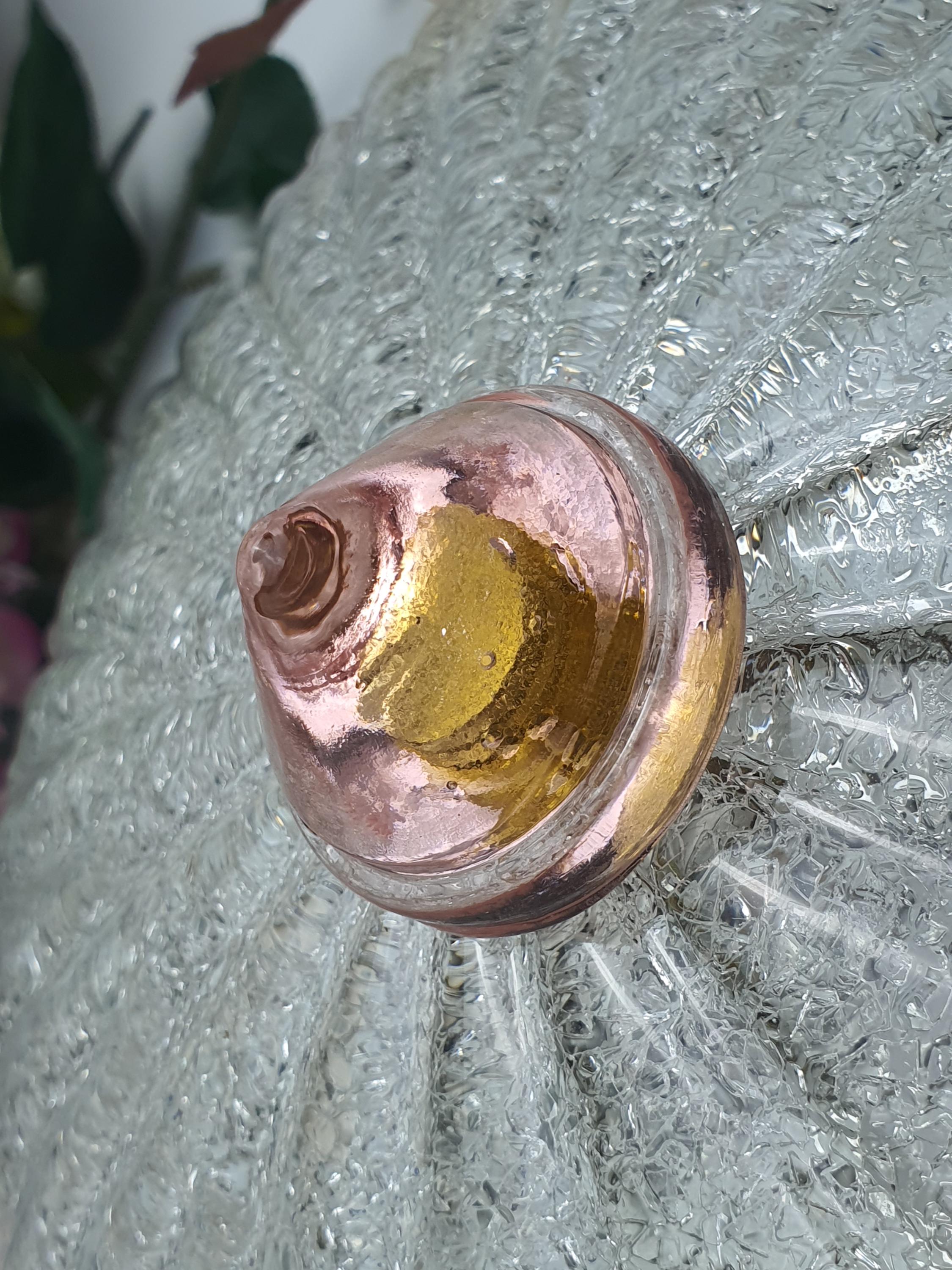 Close-up of central cone-shaped glass diffuser on vintage Murano floral flush mount, frosted graniglia texture