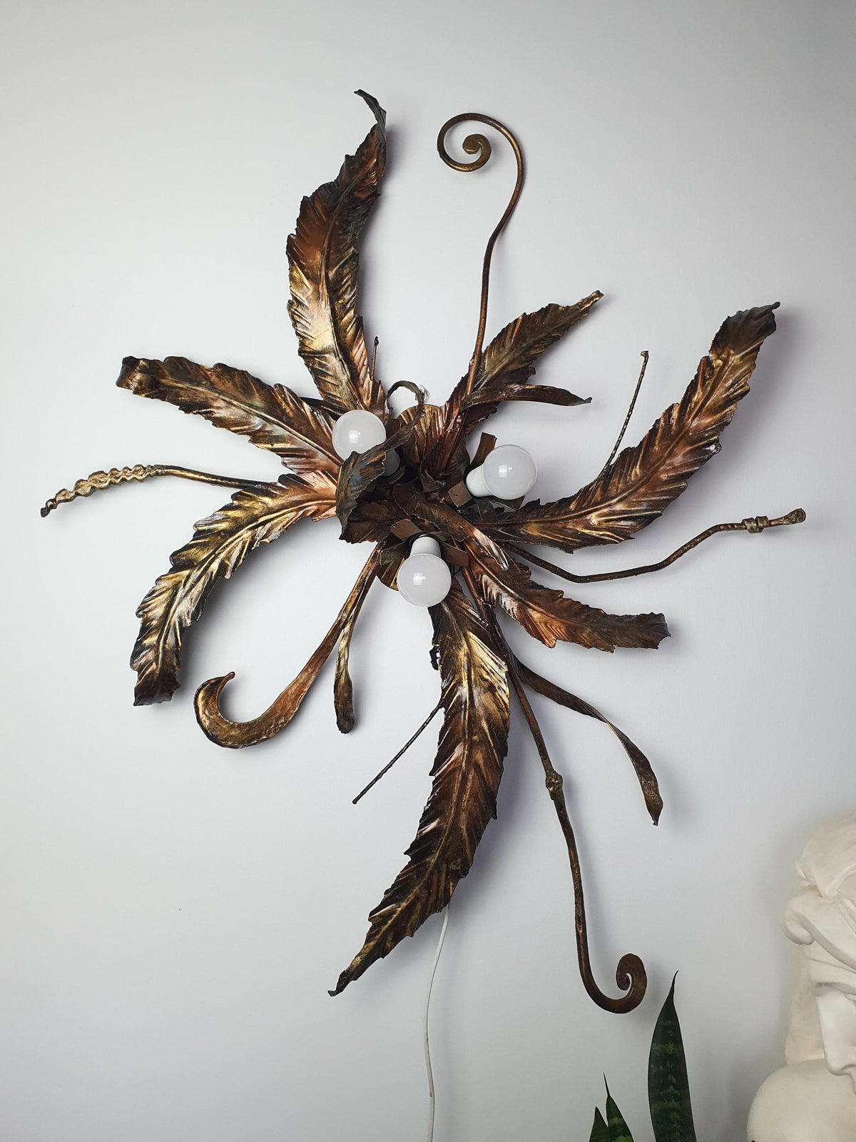 Bronze and gold tones on a vintage Italian botanical light fixture
