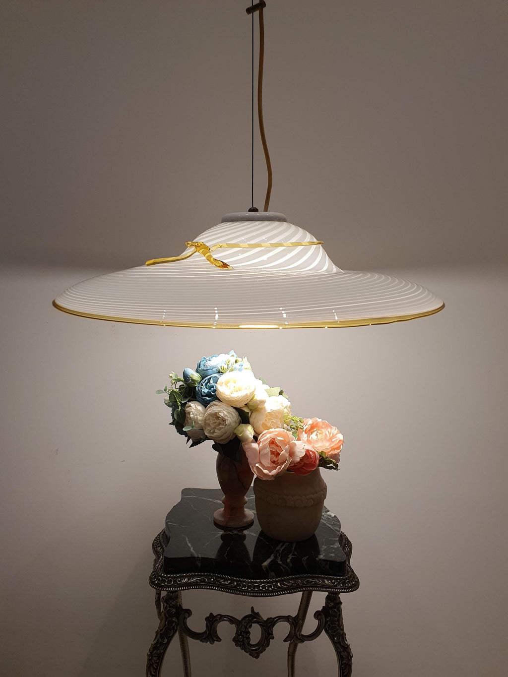 Vintage Murano glass pendant light — white swirl decoration with yellow bow accent, front view