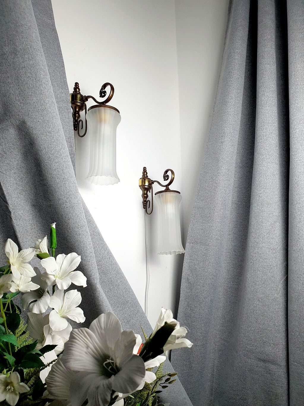 Pair of vintage Italian satin frosted flute wall sconces, brass bases, reversible up/down hook mount, classical MCM, 1980s