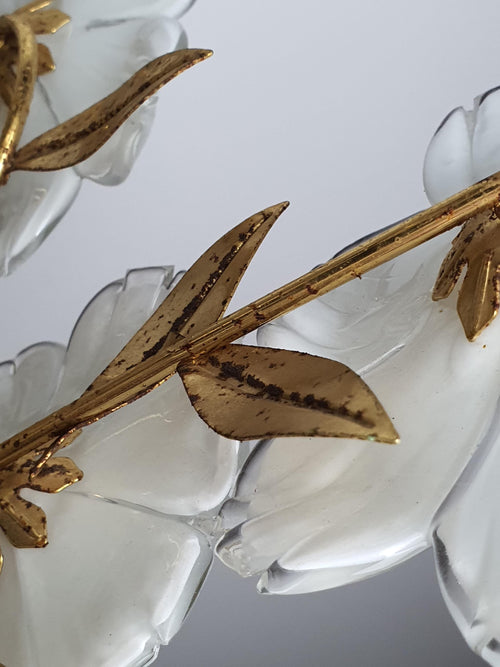 Close-up of white semi-transparent ribbed Murano glass flower petals on vintage 1980s floral chandelier