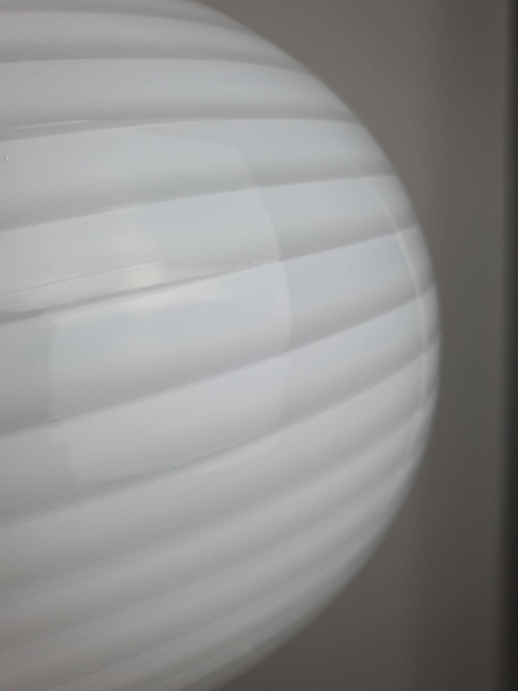 Minimalist Italian globe pendant with white swirl Murano glass and brass fittings

