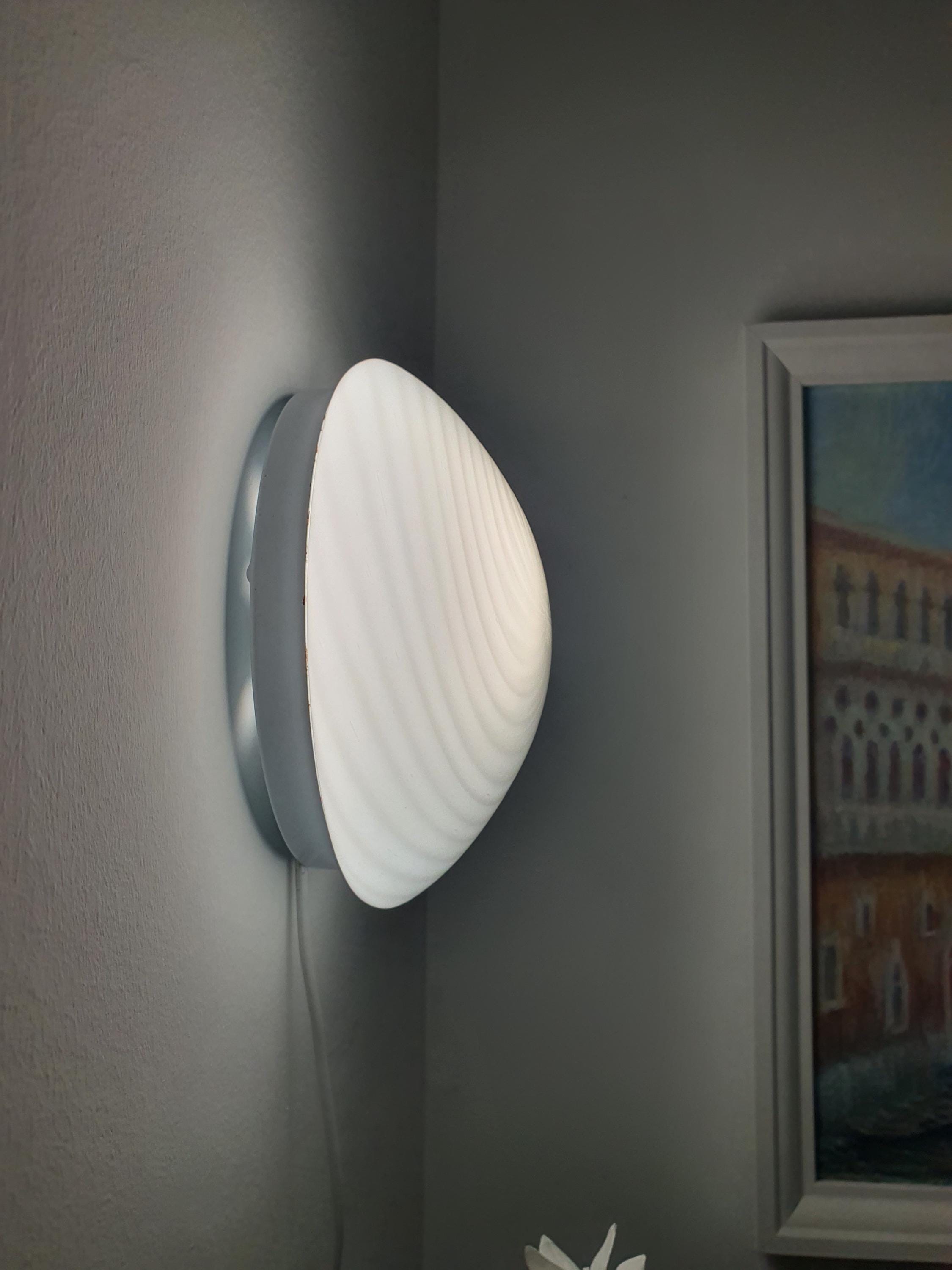 Murano glass flush mount sconce, side profile view, white swirl glass shade