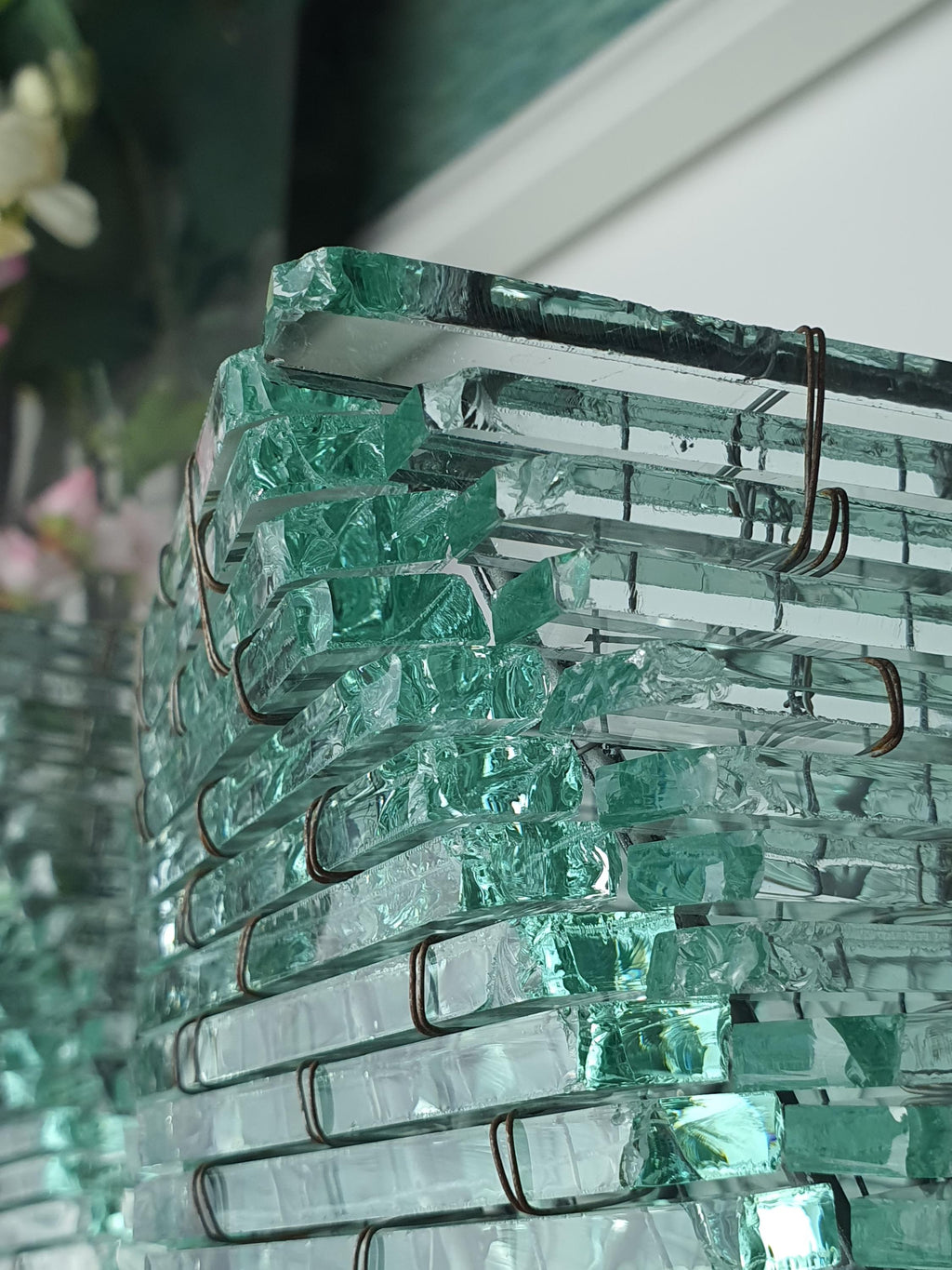 Detail of the segmented glass mosaic on a vintage bedside lamp
