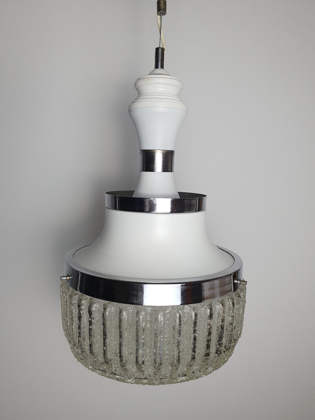 Italian handcrafted glass pendant — wooden ceiling element and chrome fitting detail