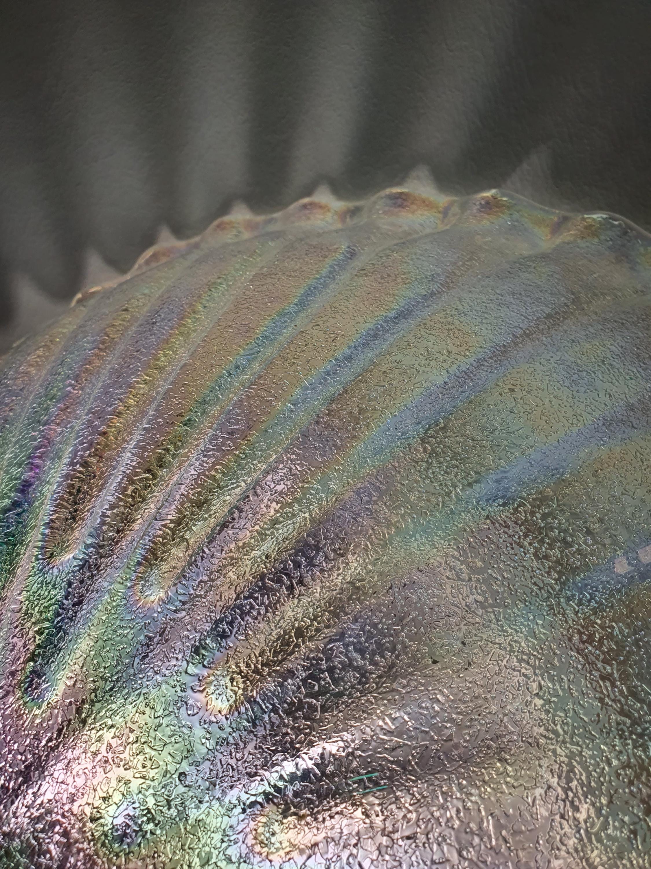 Vintage Murano ceiling light — illuminated, pearlescent glow through iridescent glass